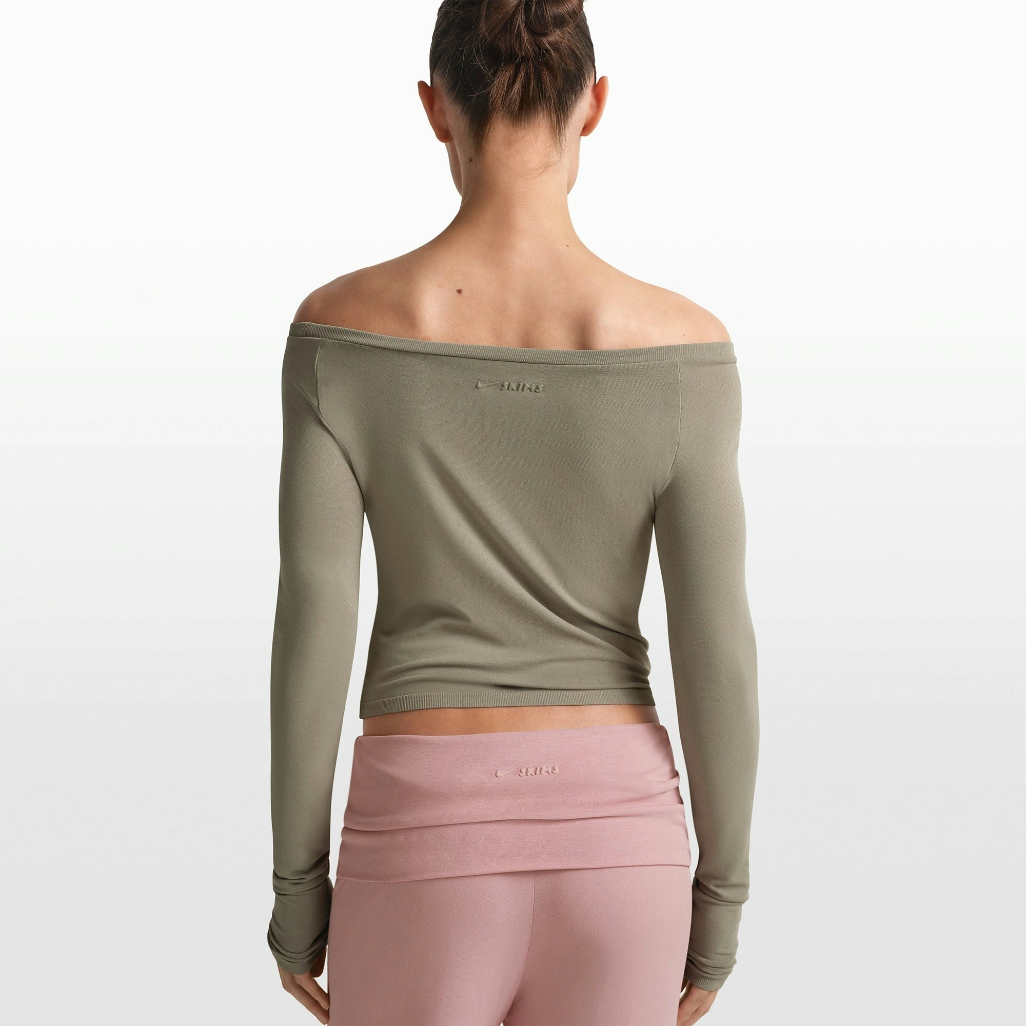 NikeSKIMS STRETCH KNIT LONG SLEEVE BOATNECK TOP | DUNE ON A MODEL FRONT VIEW @ | FOCUS: 0.0, 1.0, 0.9