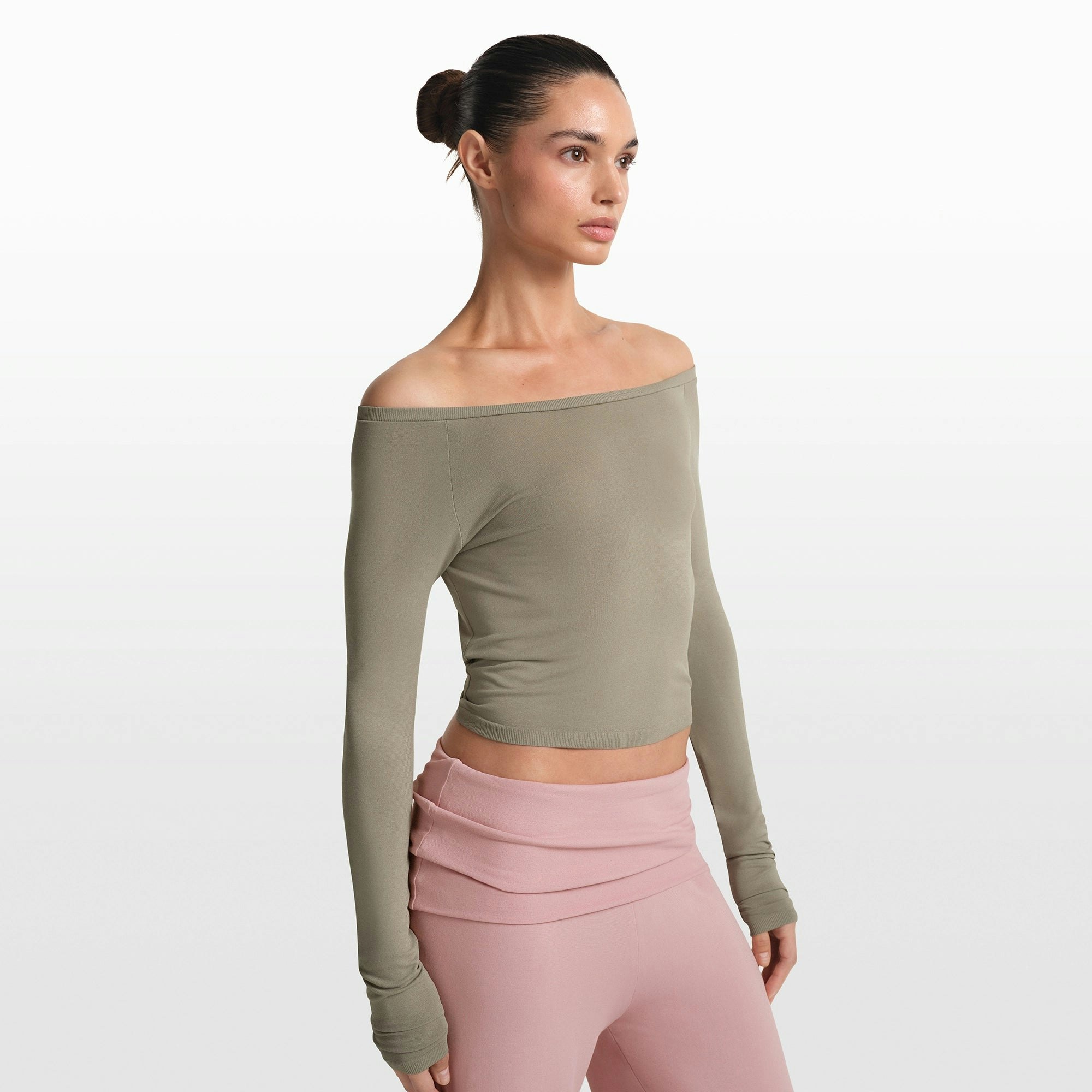 NikeSKIMS STRETCH KNIT LONG SLEEVE BOATNECK TOP | DUNE ON A MODEL FRONT VIEW @ | FOCUS: 0.0, 1.0, 0.9
