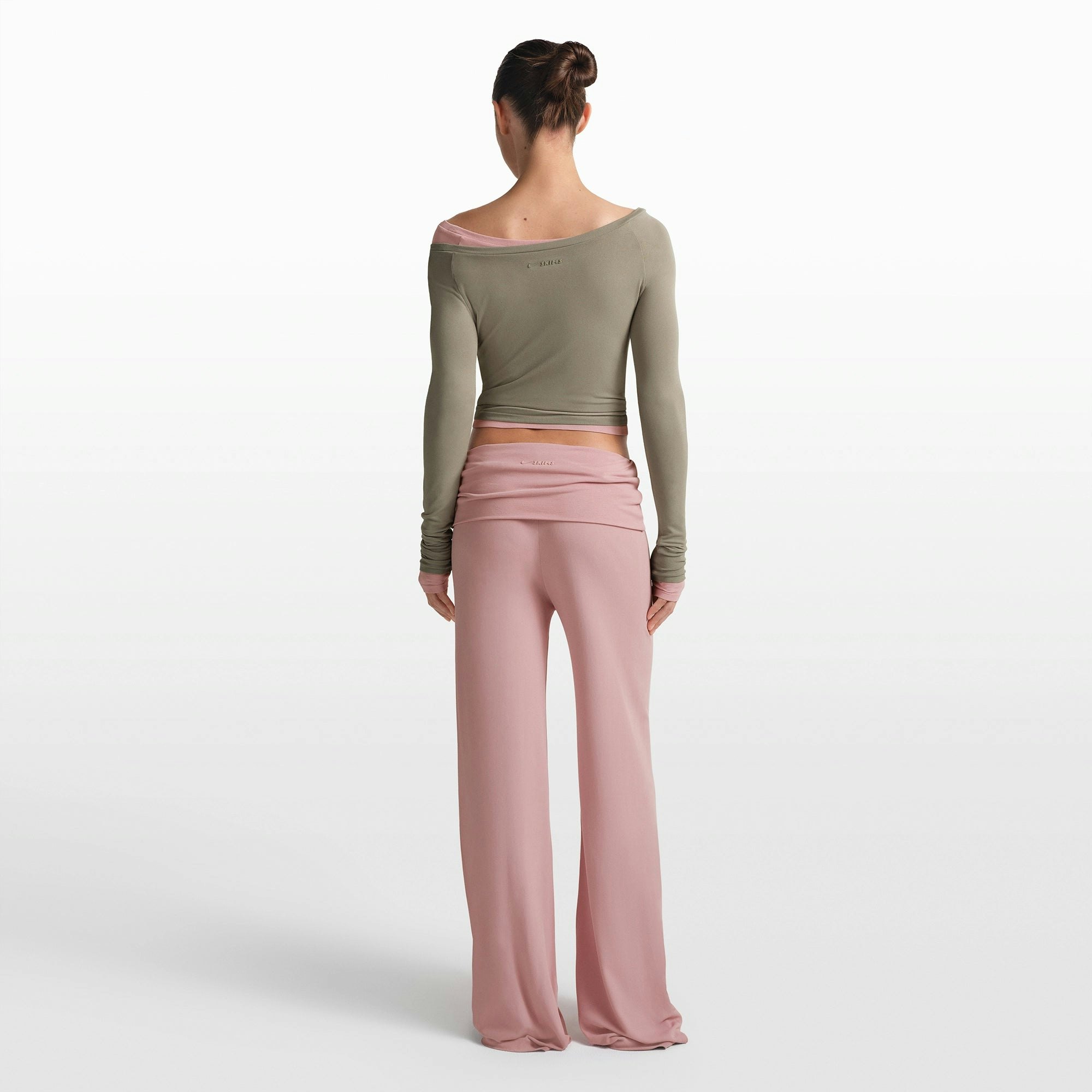 NikeSKIMS STRETCH KNIT LONG SLEEVE BOATNECK TOP | DUNE ON A MODEL FRONT VIEW @ | FOCUS: 0.0, 1.0, 0.9