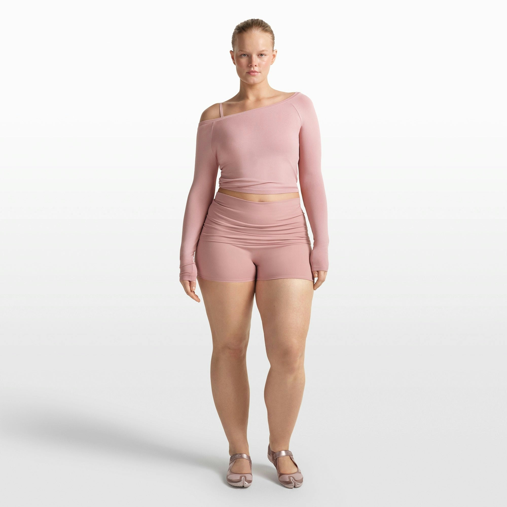 NikeSKIMS STRETCH KNIT LONG SLEEVE BOATNECK TOP | HIMALAYAN ON A MODEL FRONT VIEW @ | FOCUS: 0.0, 1.0, 0.9