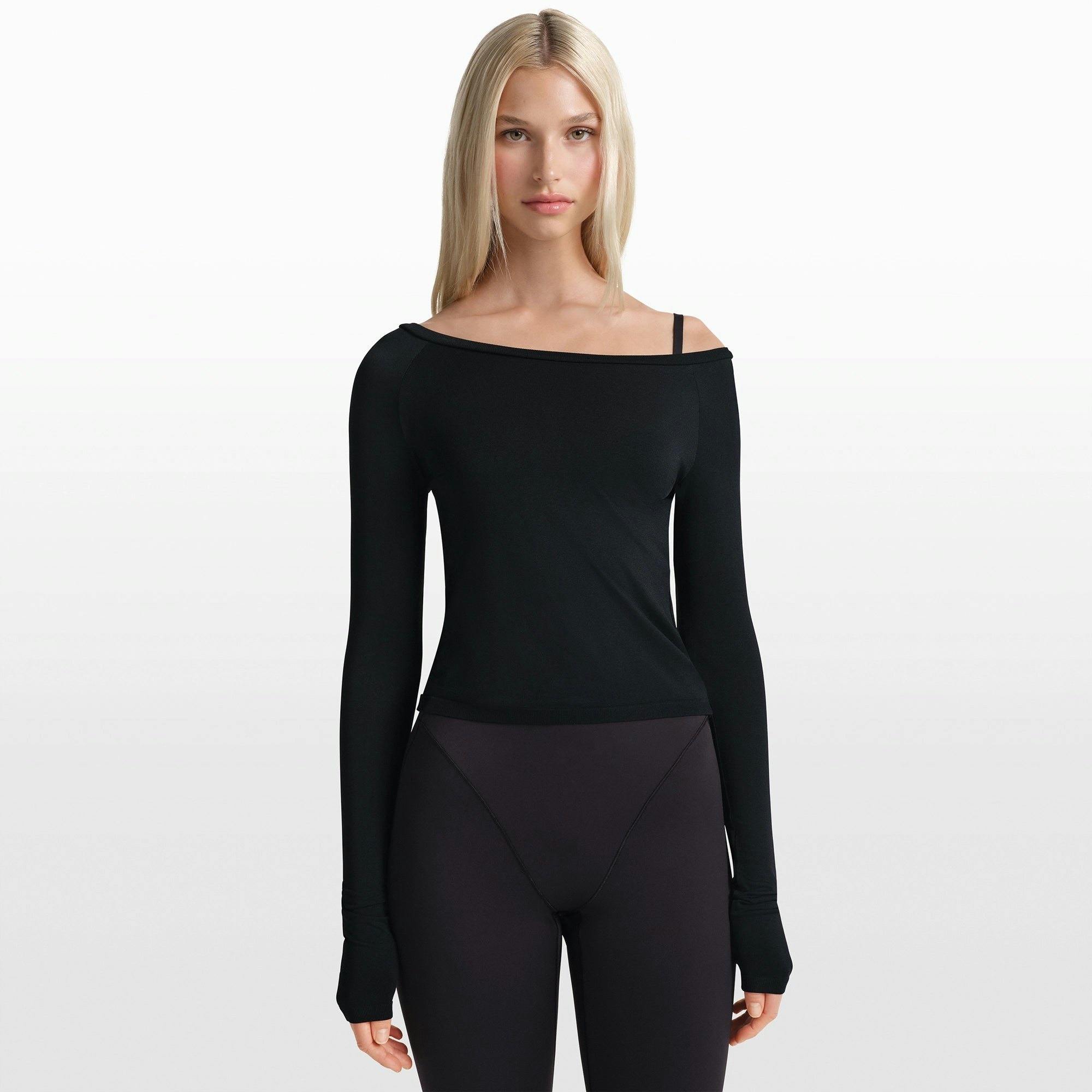NikeSKIMS STRETCH KNIT LONG SLEEVE BOATNECK TOP | OBSIDIAN ON A MODEL FRONT VIEW @ | FOCUS: 0.0, 1.0, 0.9