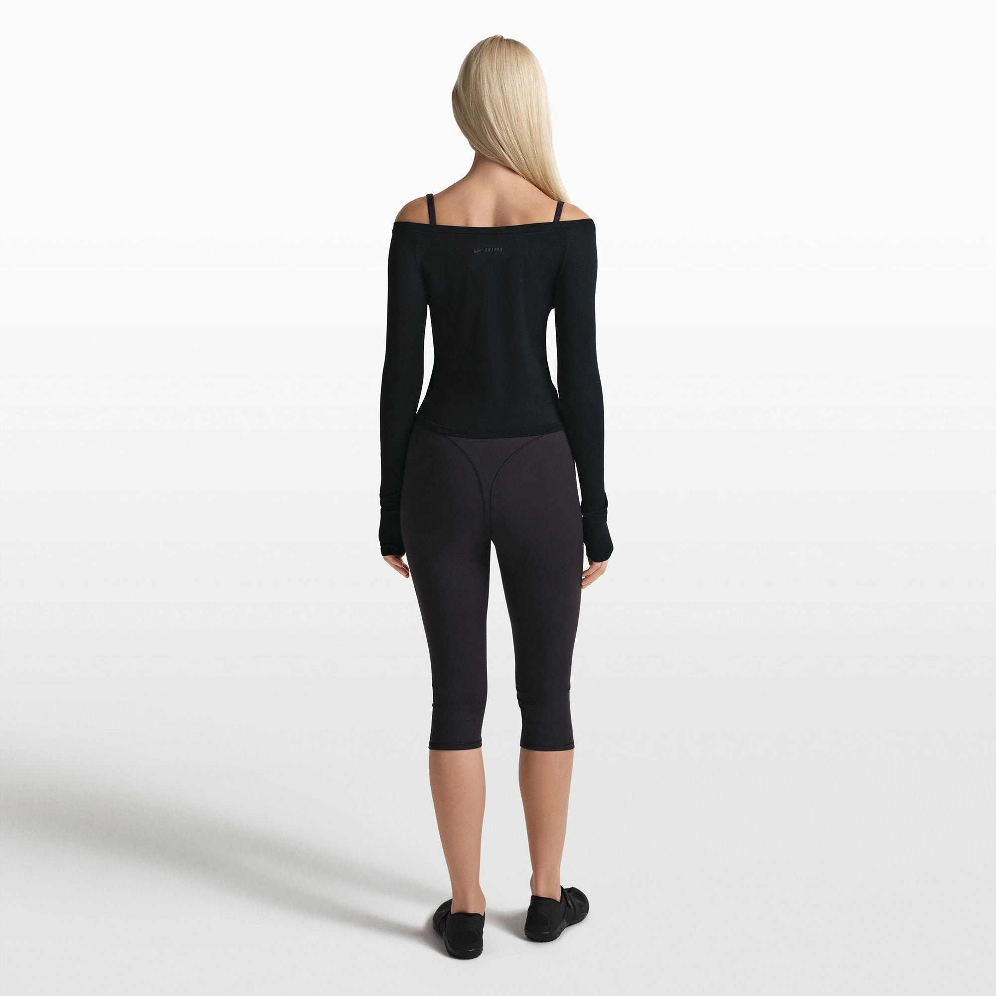 NikeSKIMS STRETCH KNIT LONG SLEEVE BOATNECK TOP | OBSIDIAN ON A MODEL FRONT VIEW @ | FOCUS: 0.0, 1.0, 0.9