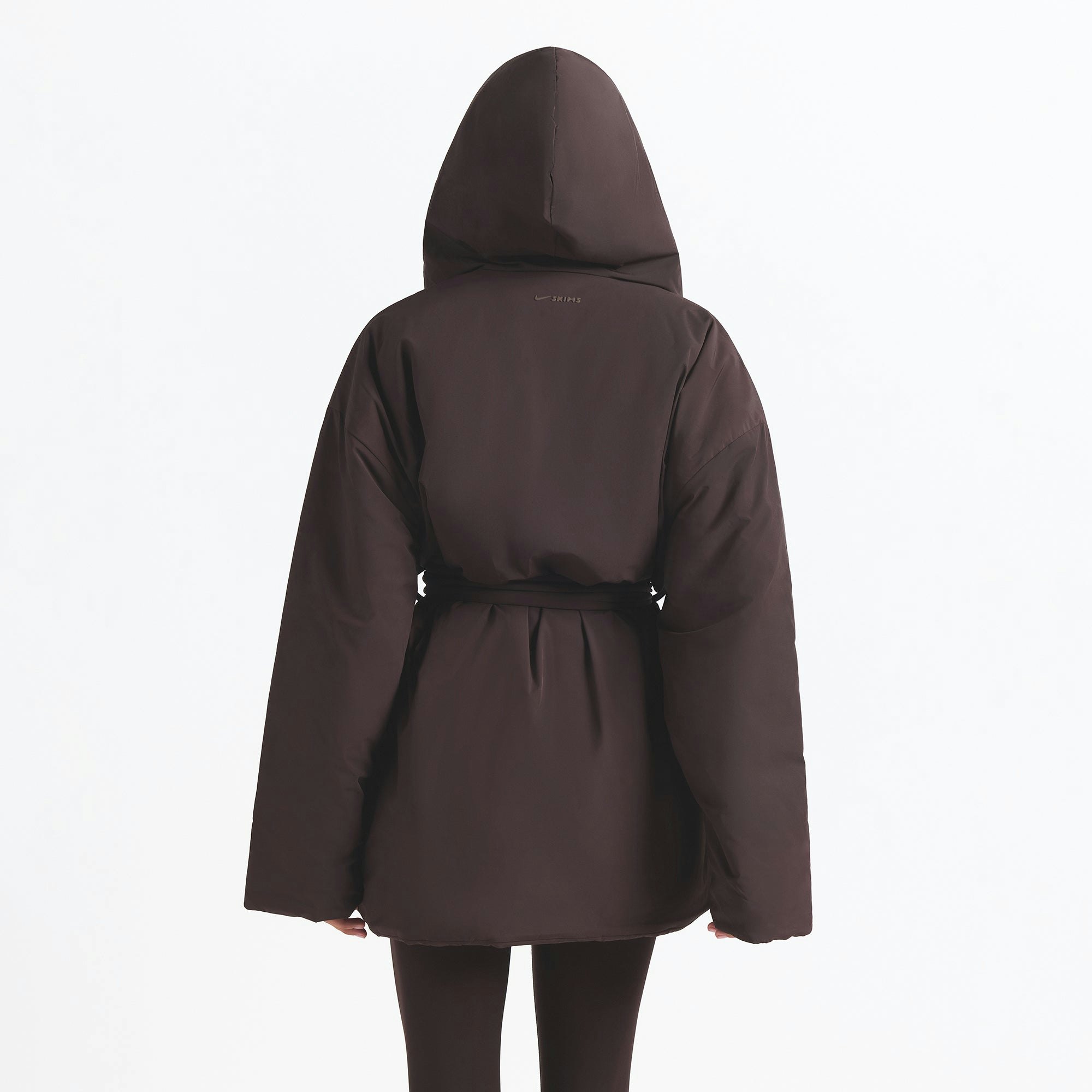 NikeSKIMS WOVEN NYLON WRAP COAT | PHOENIX ON A MODEL BACK VIEW @ | FOCUS: 0.0, 1.0, 0.9