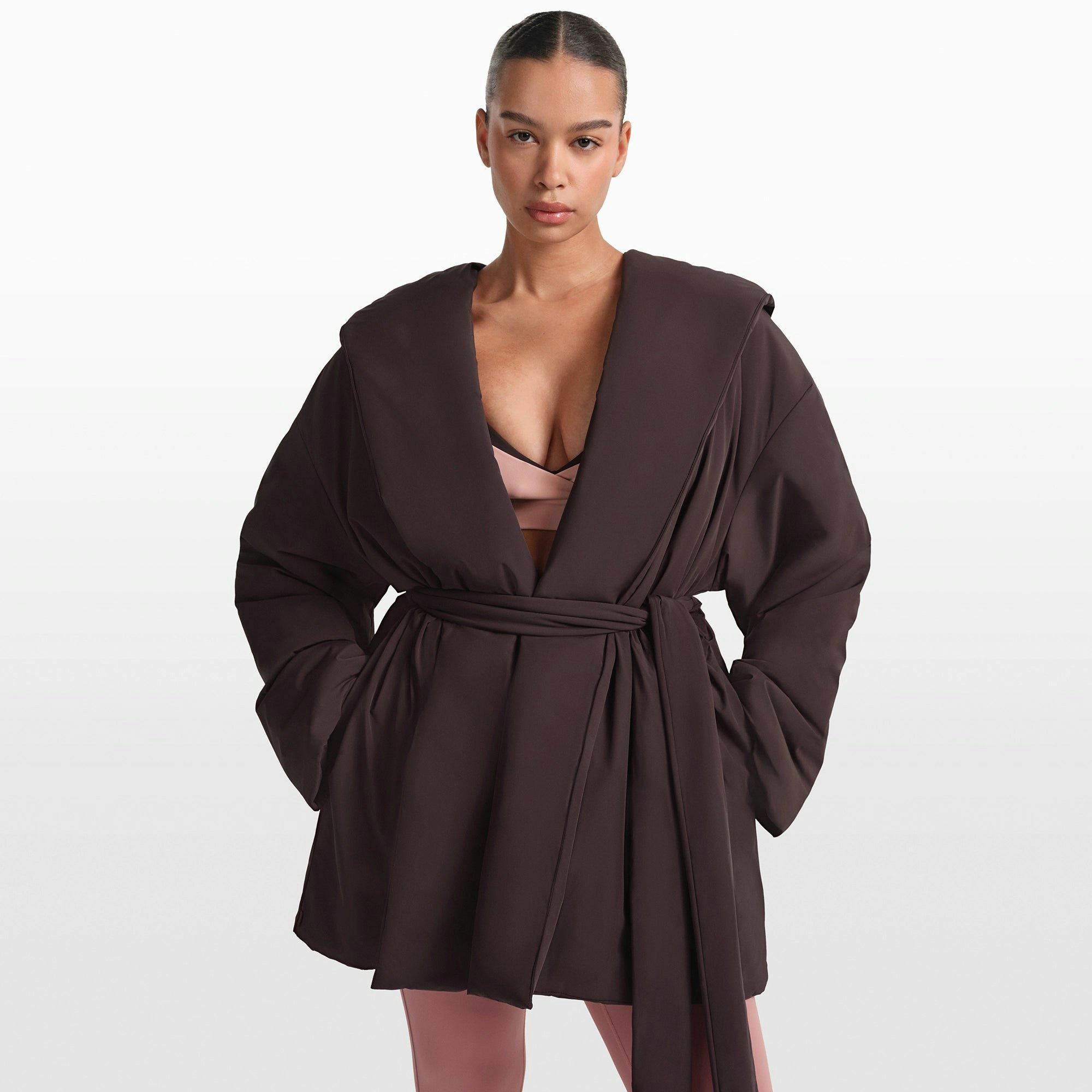 NikeSKIMS WOVEN NYLON WRAP COAT | PHOENIX ON A MODEL FRONT VIEW @ | FOCUS: 0.0, 1.0, 0.9