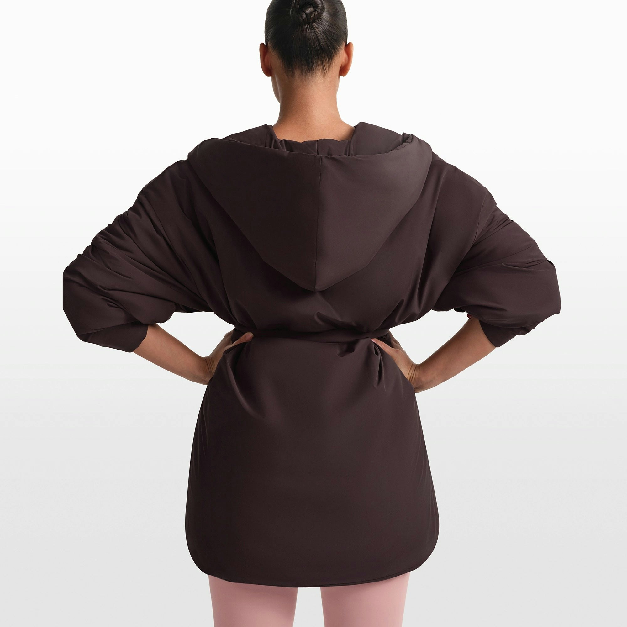 NikeSKIMS WOVEN NYLON WRAP COAT | PHOENIX ON A MODEL FRONT VIEW @ | FOCUS: 0.0, 1.0, 0.9