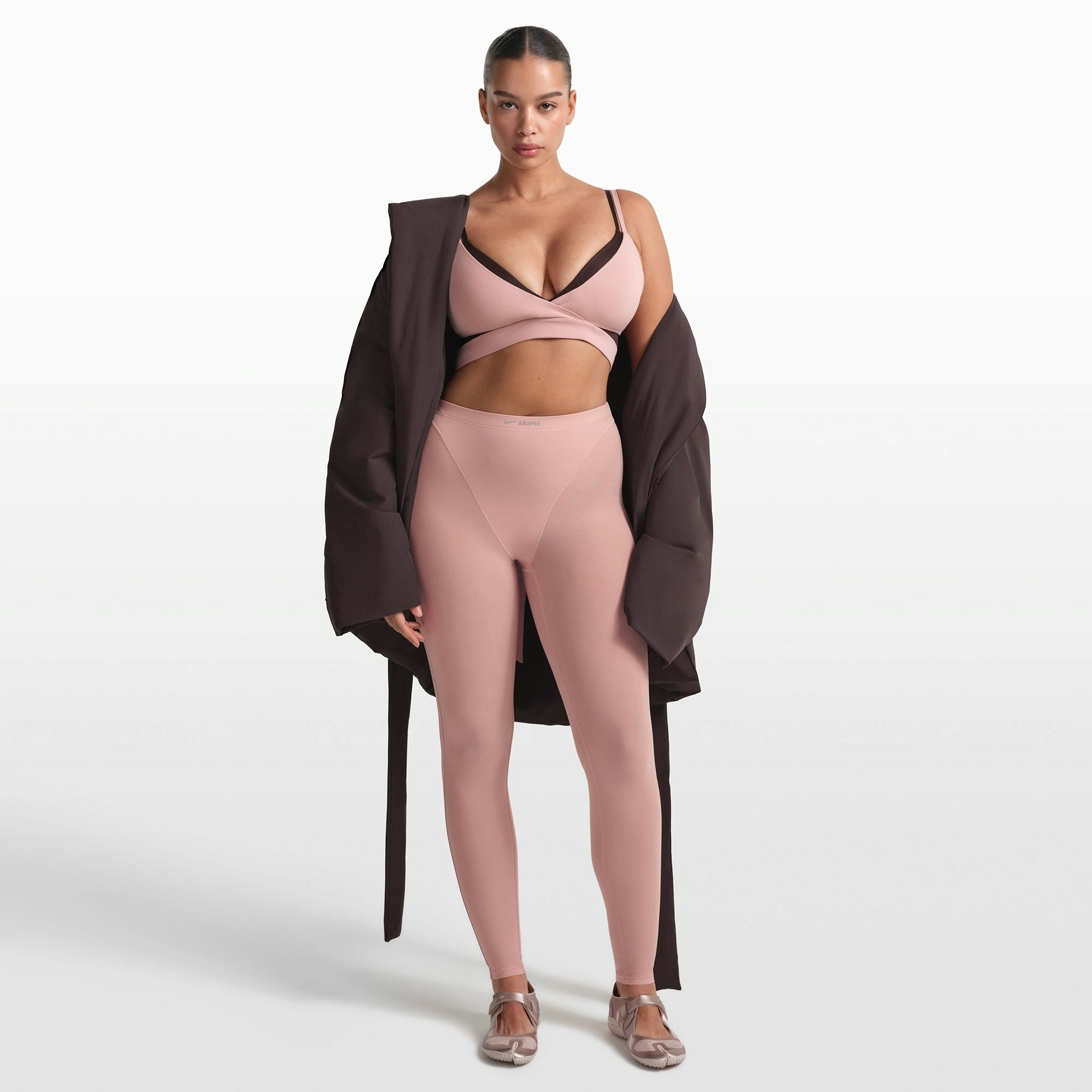 NikeSKIMS WOVEN NYLON WRAP COAT | PHOENIX ON A MODEL FRONT VIEW @ | FOCUS: 0.0, 1.0, 0.9