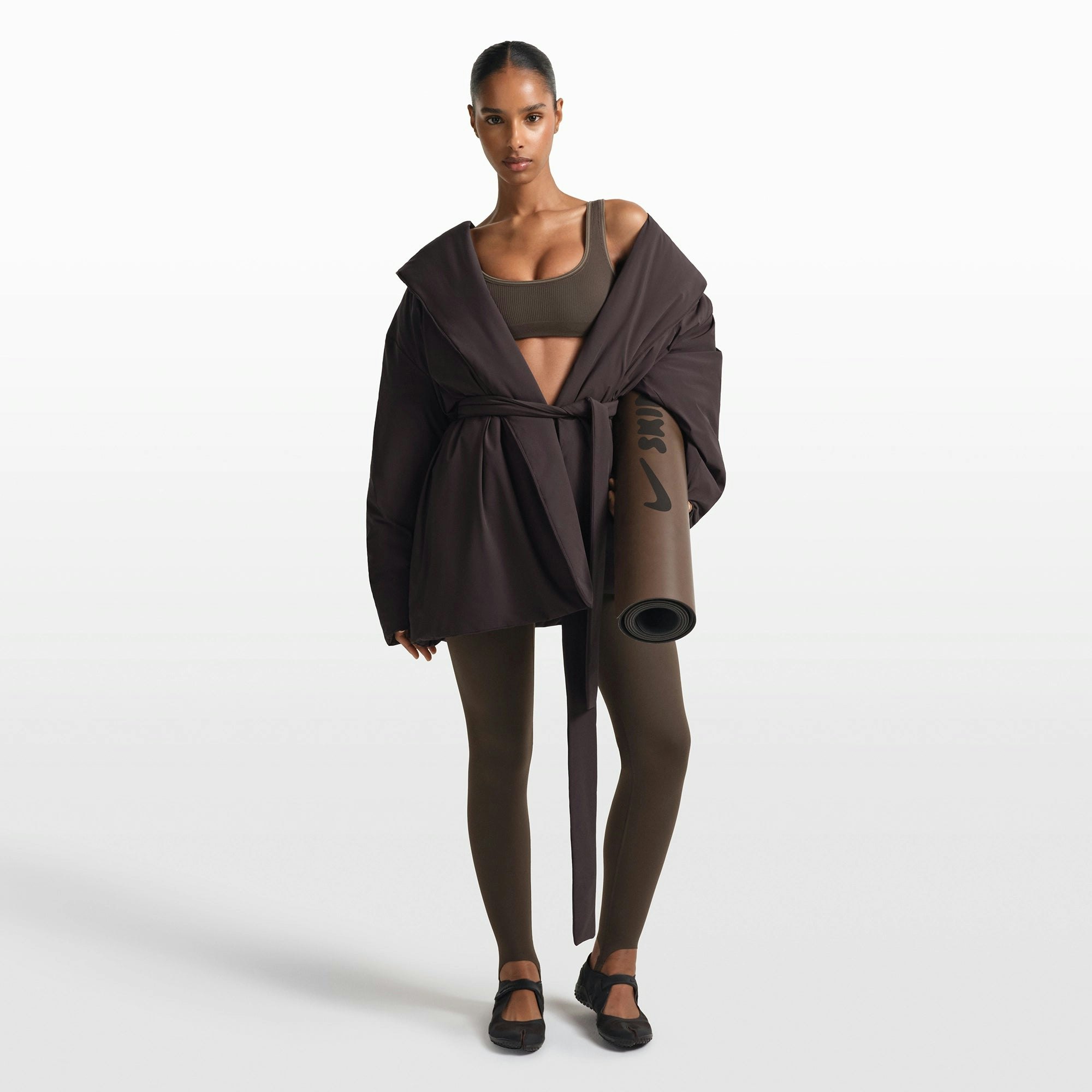 NikeSKIMS WOVEN NYLON WRAP COAT | PHOENIX ON A MODEL FRONT VIEW @ | FOCUS: 0.0, 1.0, 0.9