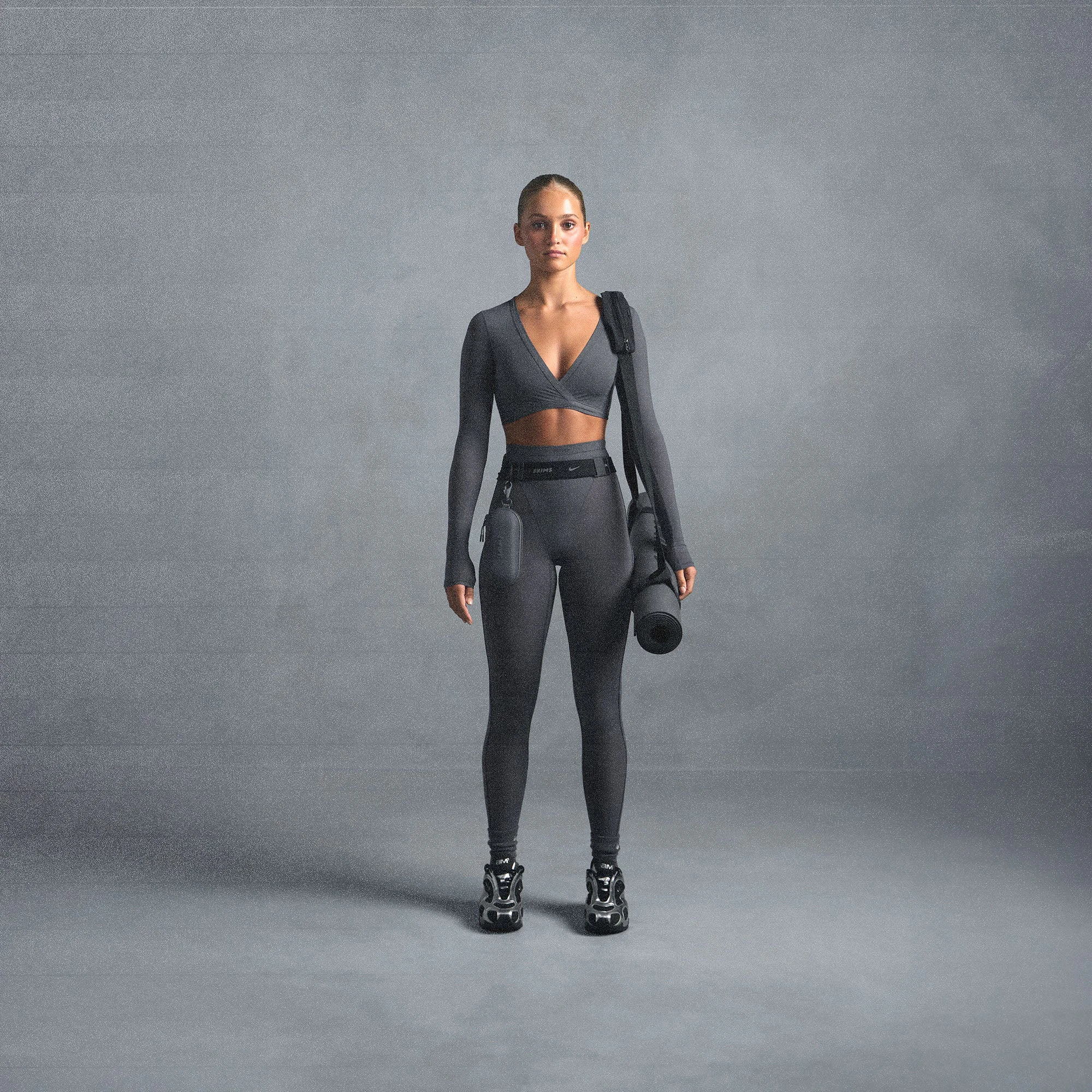 NikeSKIMS WEIGHTLESS LAYERS WRAP TOP | LEAD ON A MODEL SIDE VIEW @ | FOCUS: 0.0, 1.0, 0.9