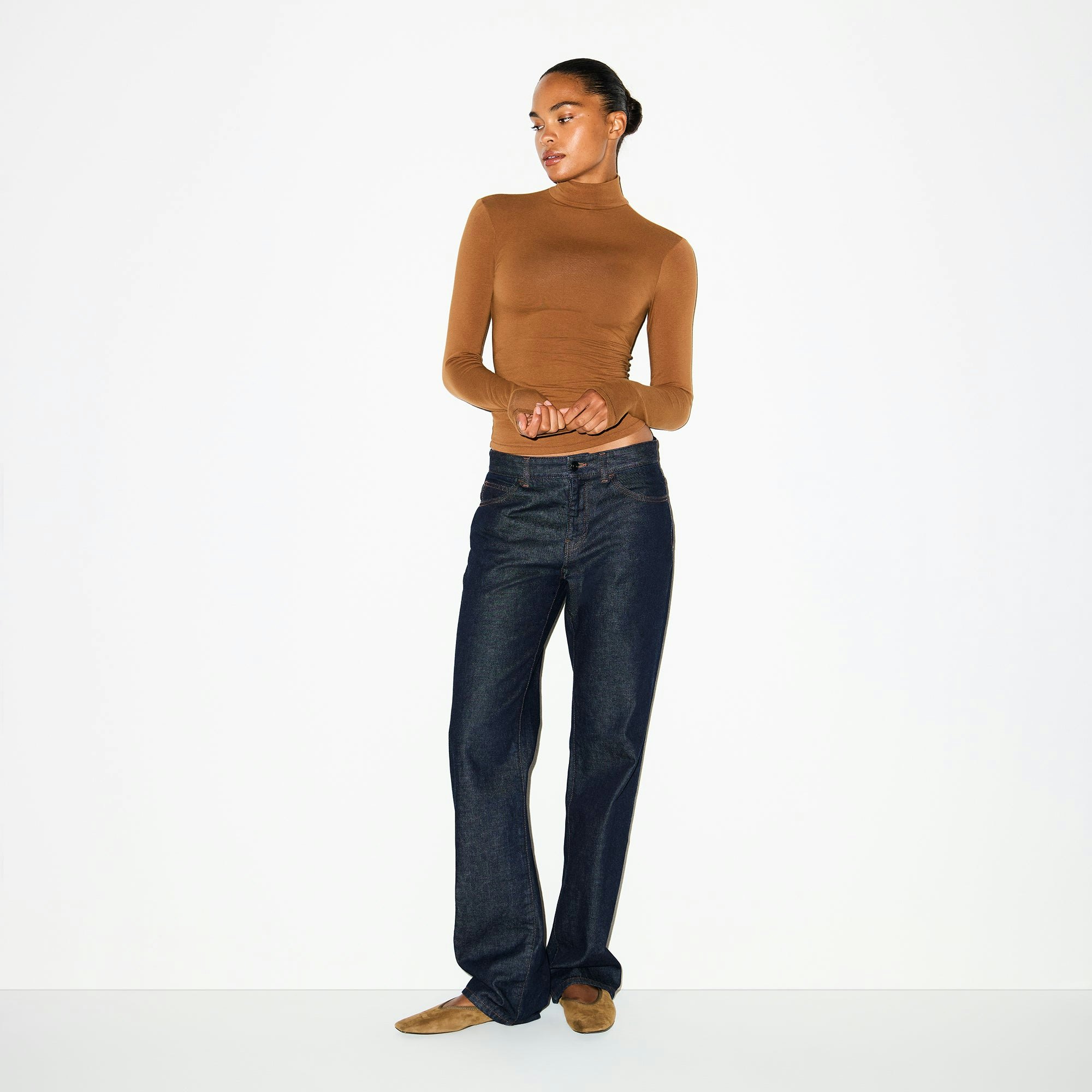 COTTON JERSEY TURTLENECK | CHAI ON A MODEL FRONT VIEW @ | FOCUS: 0.0, 1.0, 0.9