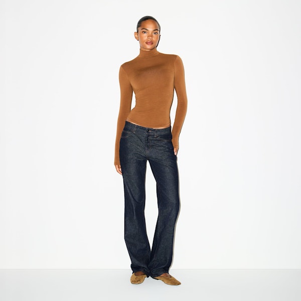 COTTON JERSEY TURTLENECK | CHAI ON A MODEL FRONT VIEW @ | FOCUS: 0.0, 1.0, 0.9
