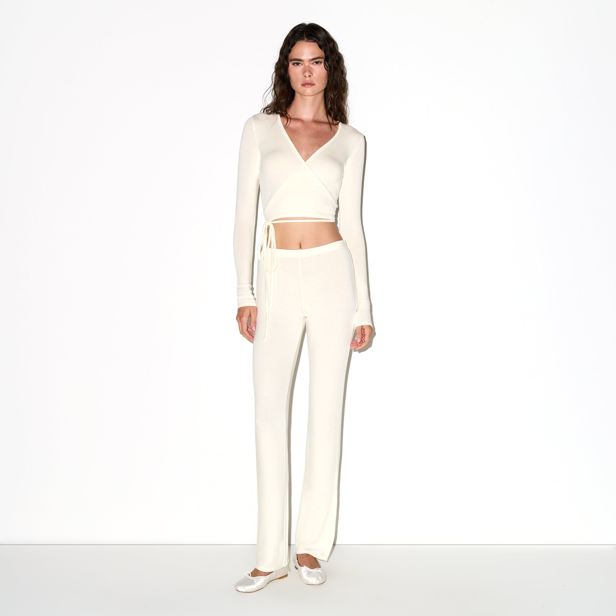 LIGHTWEIGHT MODAL LONG SLEEVE WRAP TOP | ECRU ON A MODEL FRONT VIEW @ | FOCUS: 0.0, 1.0, 0.9