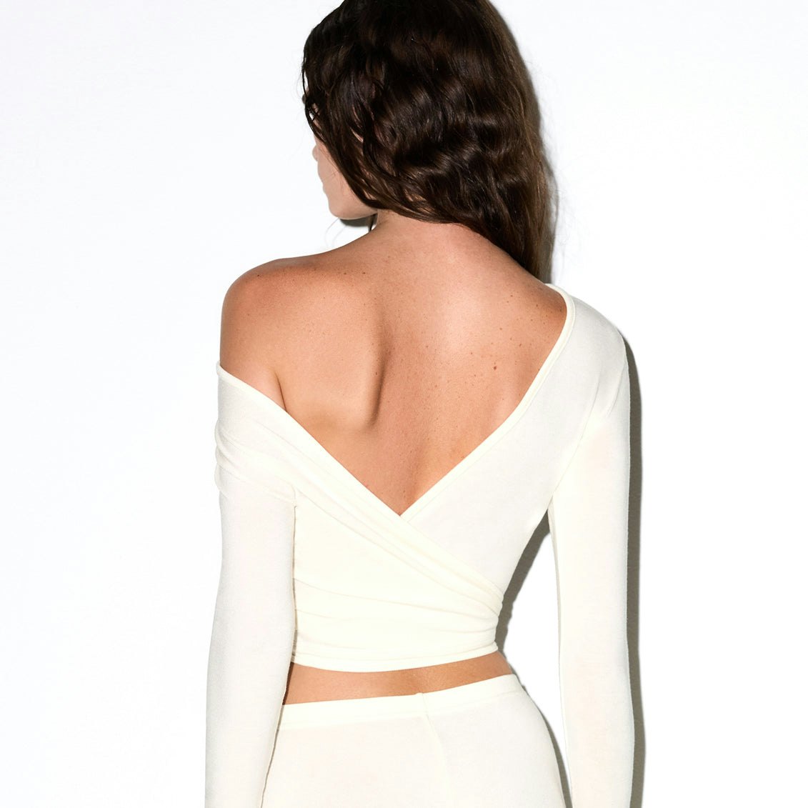 LIGHTWEIGHT MODAL LONG SLEEVE WRAP TOP | ECRU ON A MODEL SIDE VIEW @ | FOCUS: 0.0, 1.0, 0.9
