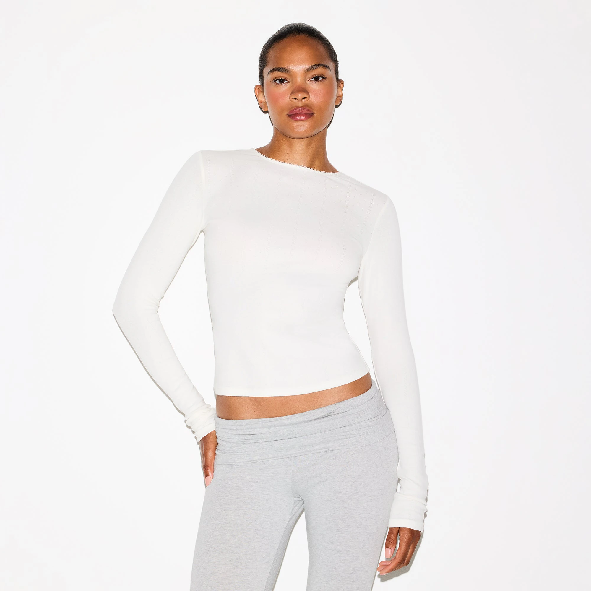 DROP NEEDLE POINTELLE LONG SLEEVE TOP | MARBLE ON A MODEL FRONT VIEW @ | FOCUS: 0.0, 1.0, 0.9