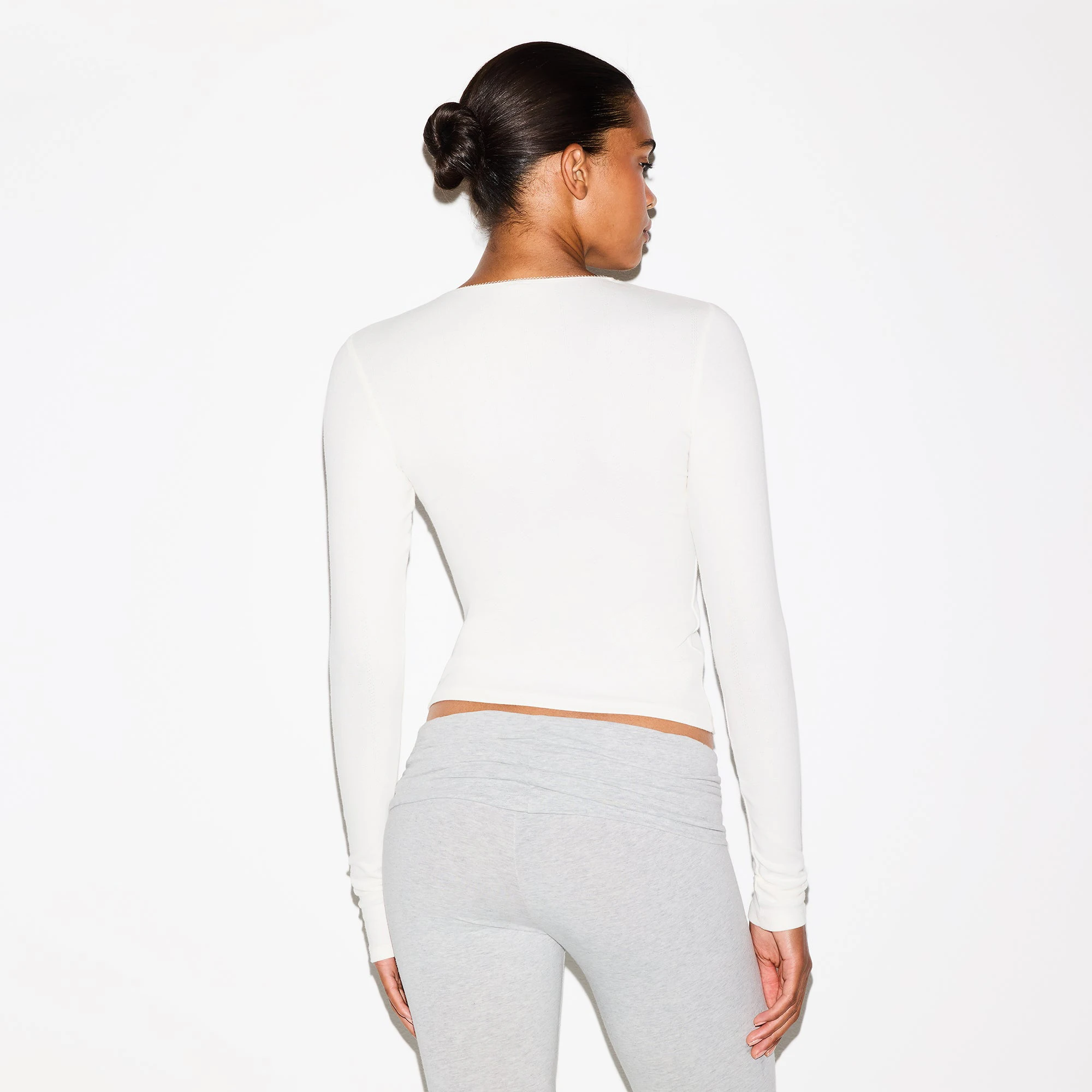 DROP NEEDLE POINTELLE LONG SLEEVE TOP | MARBLE ON A MODEL BACK VIEW @ | FOCUS: 0.0, 1.0, 0.9