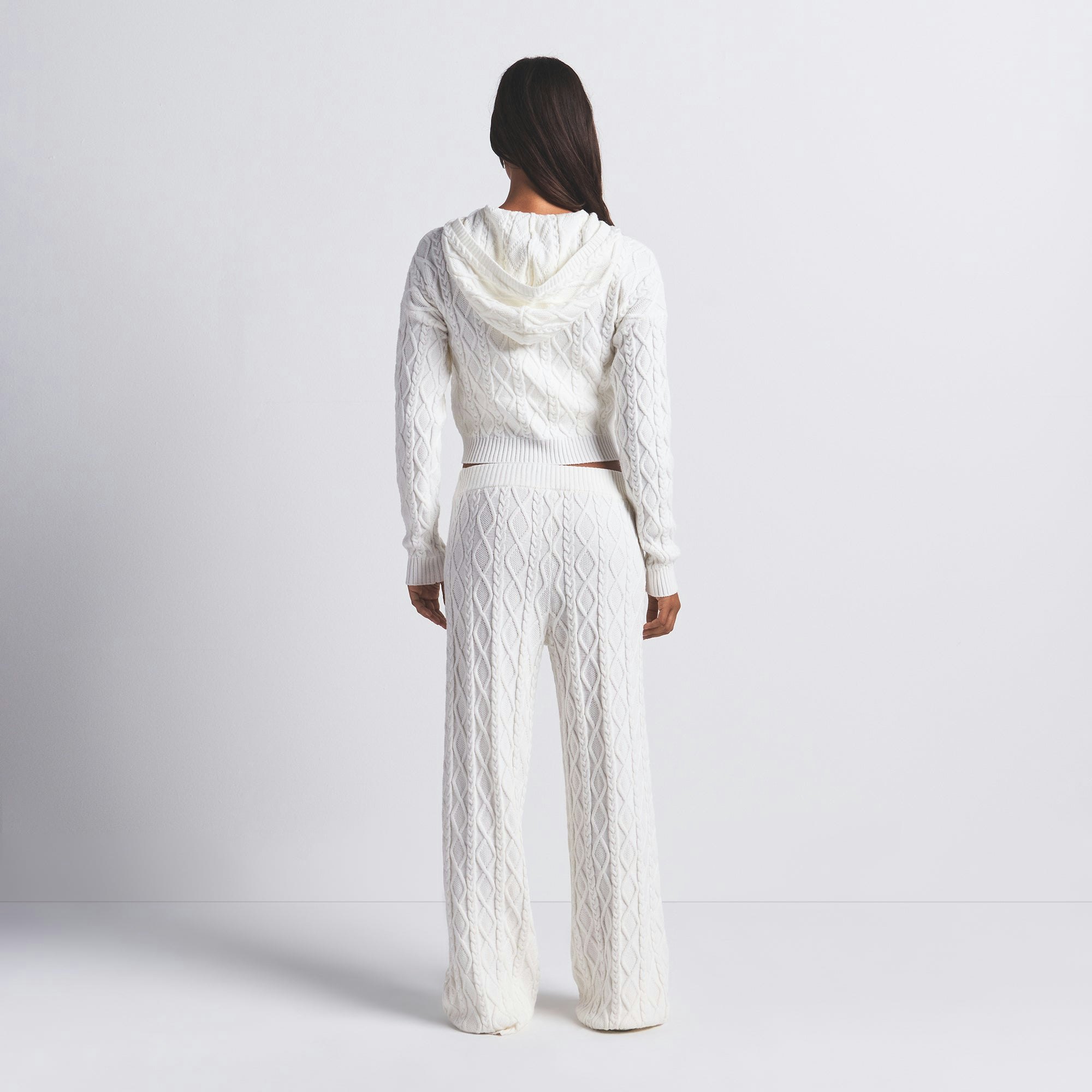 SWEATER KNIT SHRUNKEN ZIP UP HOODIE | IVORY ON A MODEL BACK VIEW @ | FOCUS: 0.0, 1.0, 0.9