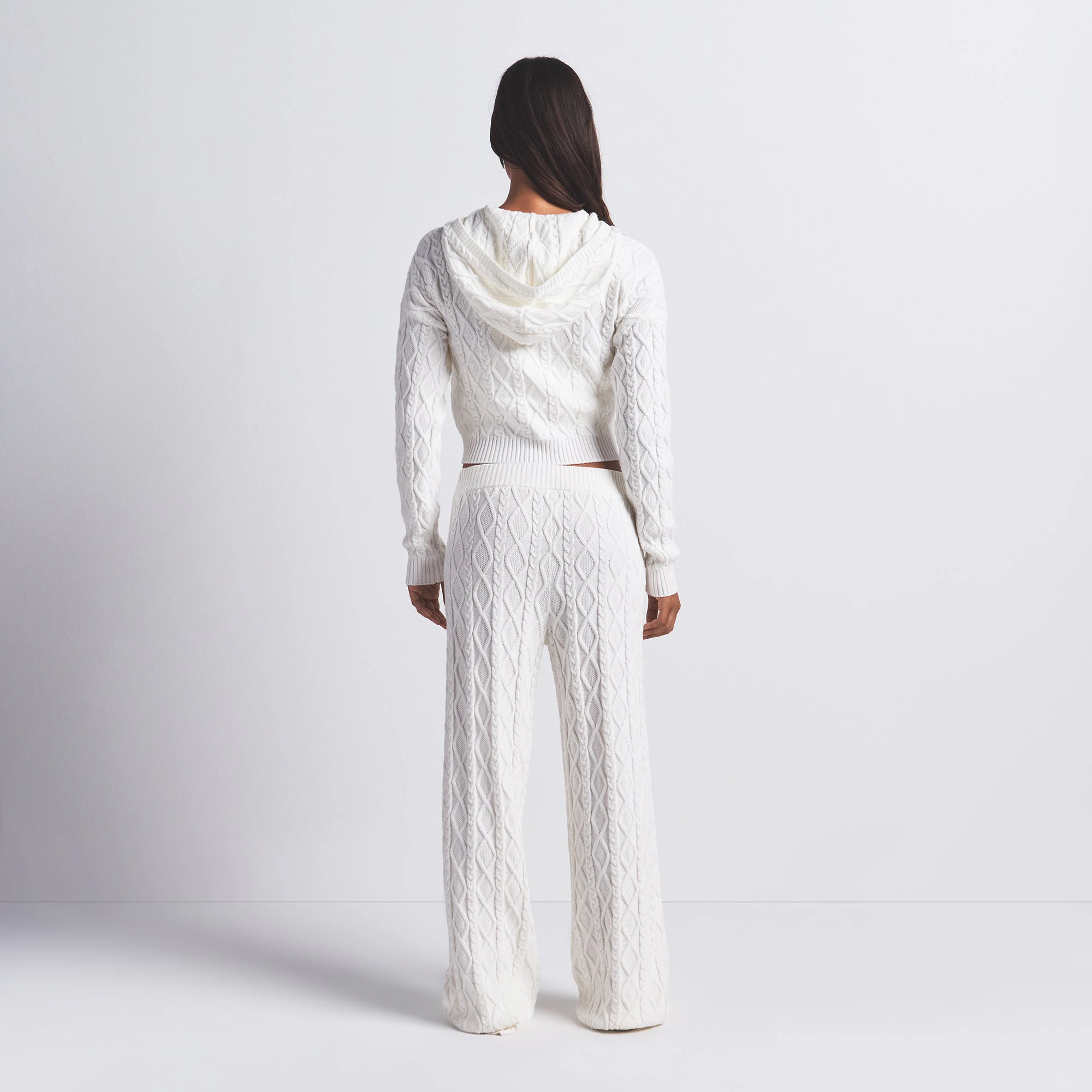 SWEATER KNIT SHRUNKEN ZIP UP HOODIE | IVORY ON A MODEL BACK VIEW @ | FOCUS: 0.0, 1.0, 0.9