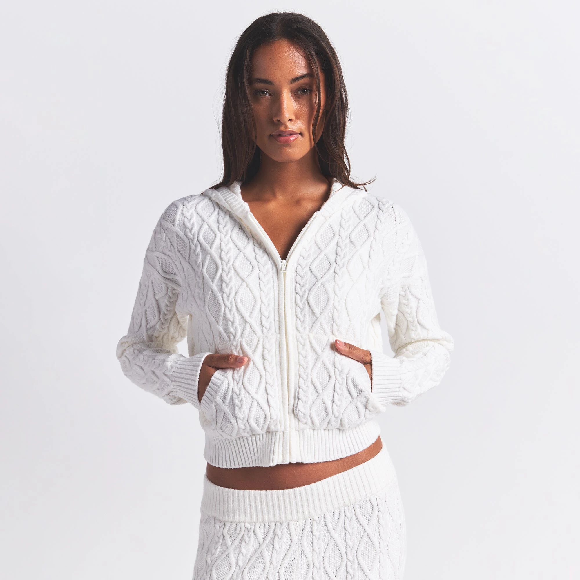 SWEATER KNIT SHRUNKEN ZIP UP HOODIE | IVORY ON A MODEL FRONT VIEW @ | FOCUS: 0.0, 1.0, 0.9