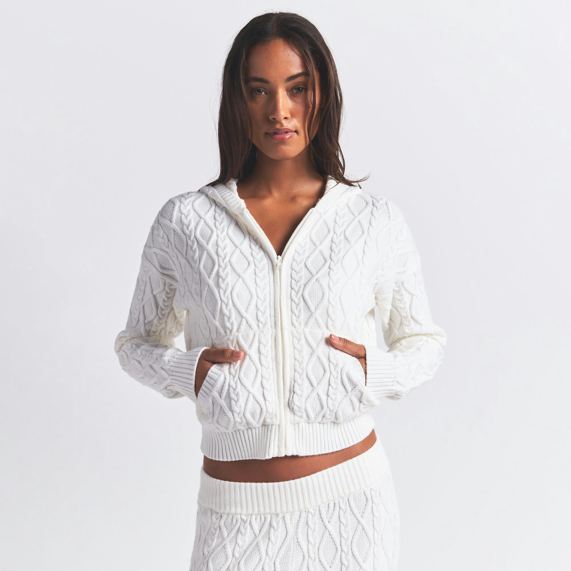 SWEATER KNIT SHRUNKEN ZIP UP HOODIE | IVORY ON A MODEL FRONT VIEW @ | FOCUS: 0.0, 1.0, 0.9