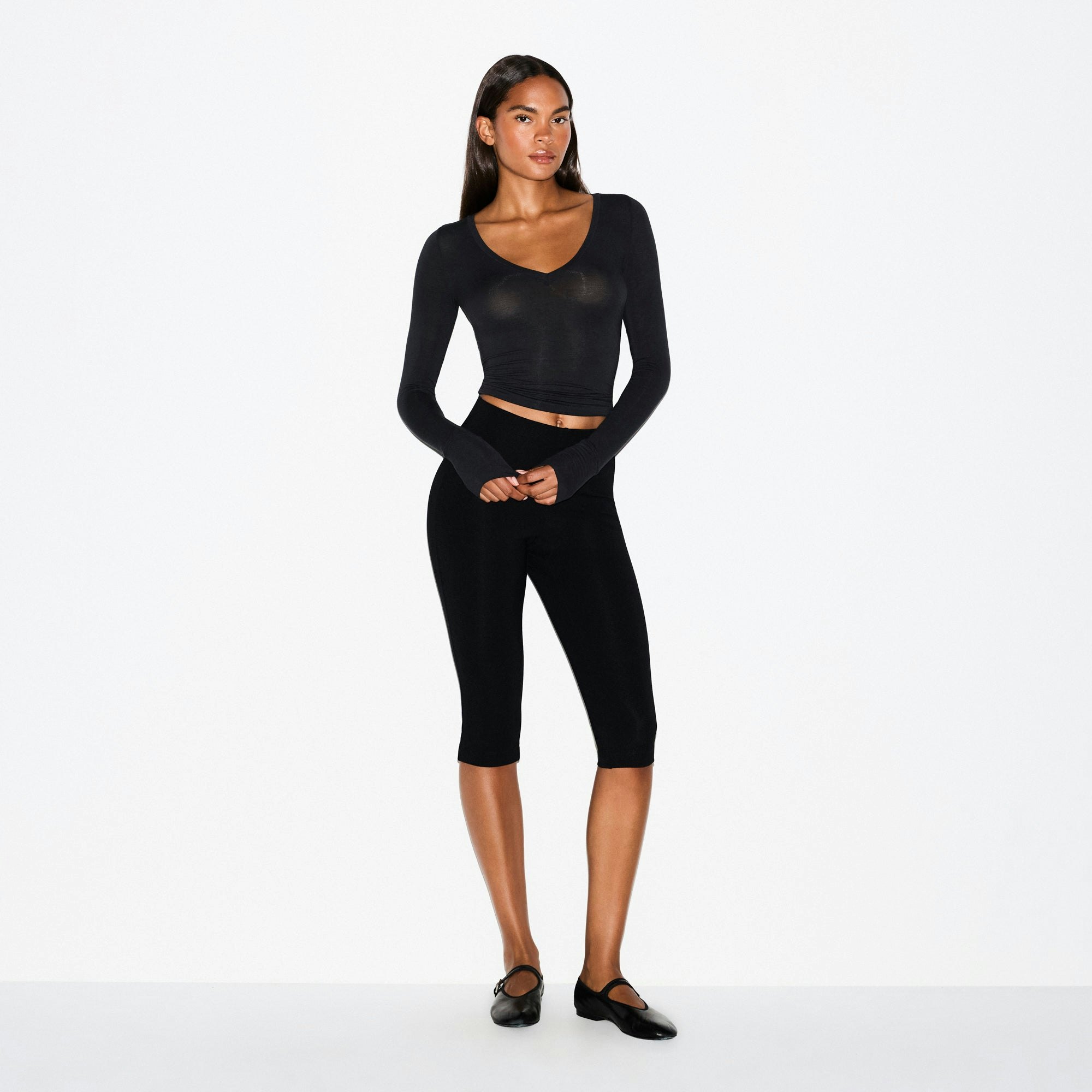 SHEER MODAL LONG SLEEVE V NECK | ONYX ON A MODEL FRONT VIEW @ | FOCUS: 0.0, 1.0, 0.9