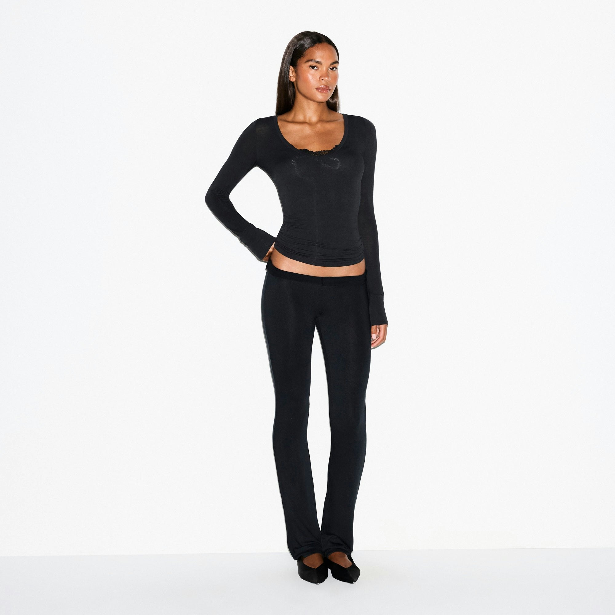 SHEER MODAL LONG SLEEVE V NECK | ONYX ON A MODEL FRONT VIEW @ | FOCUS: 0.0, 1.0, 0.9