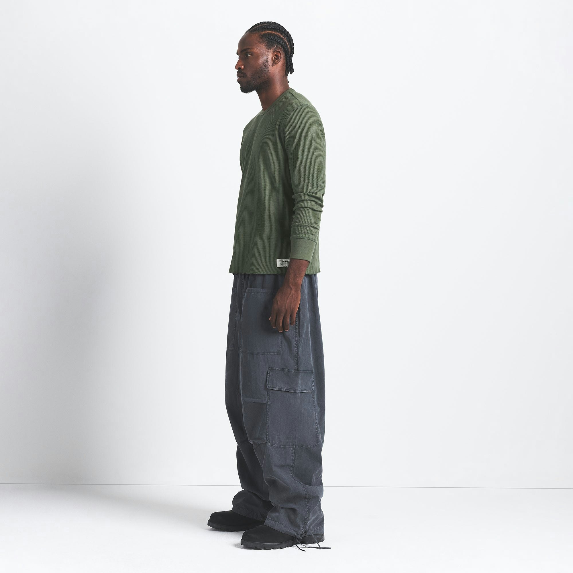 WAFFLE MENS LONG SLEEVE TOP | MILITARY GREEN ON A MODEL SIDE VIEW @ | FOCUS: 0.0, 1.0, 0.9