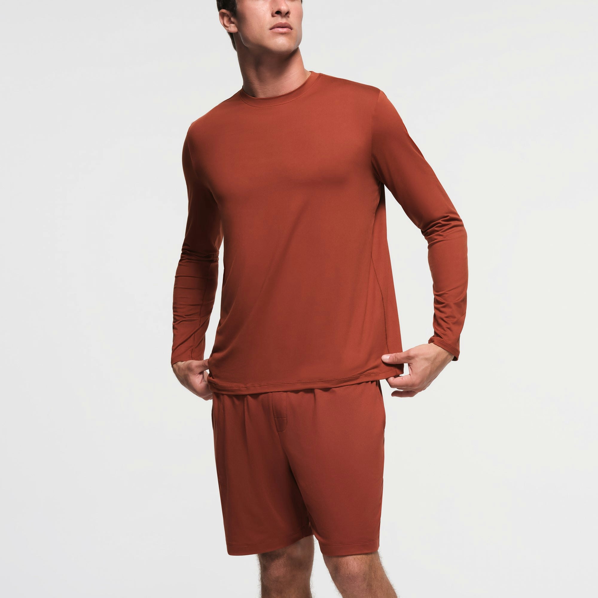 OUTDOOR JERSEY MENS LONG SLEEVE T-SHIRT | RUST ON A MODEL FRONT VIEW