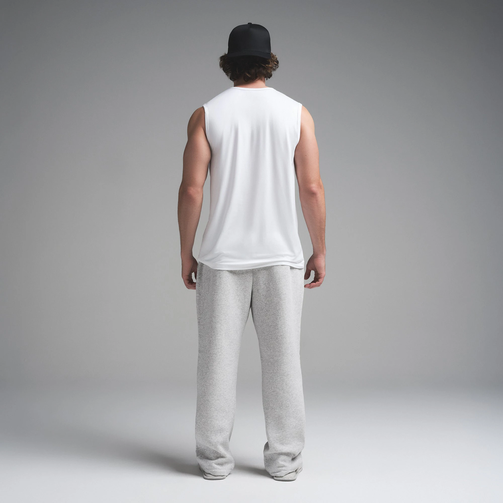 OUTDOOR JERSEY MENS MUSCLE TANK | CHALK ON A MODEL SIDE VIEW | FOCUS: 0.0, 1.0, 0.9