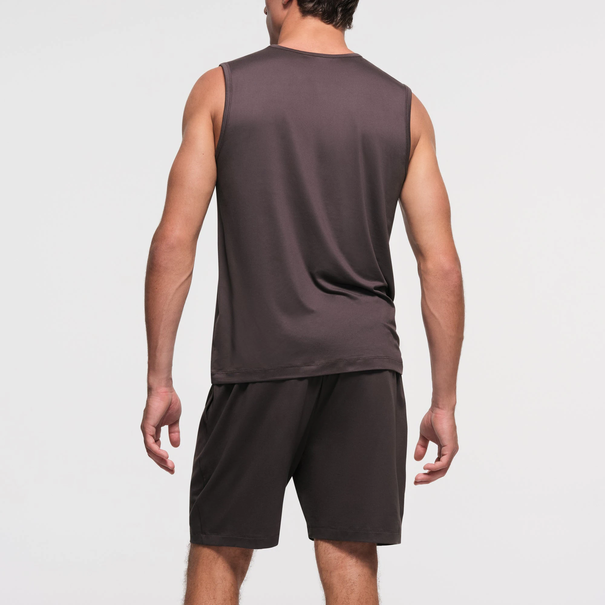 OUTDOOR JERSEY MENS MUSCLE TANK | IRON ON A MODEL BACK VIEW