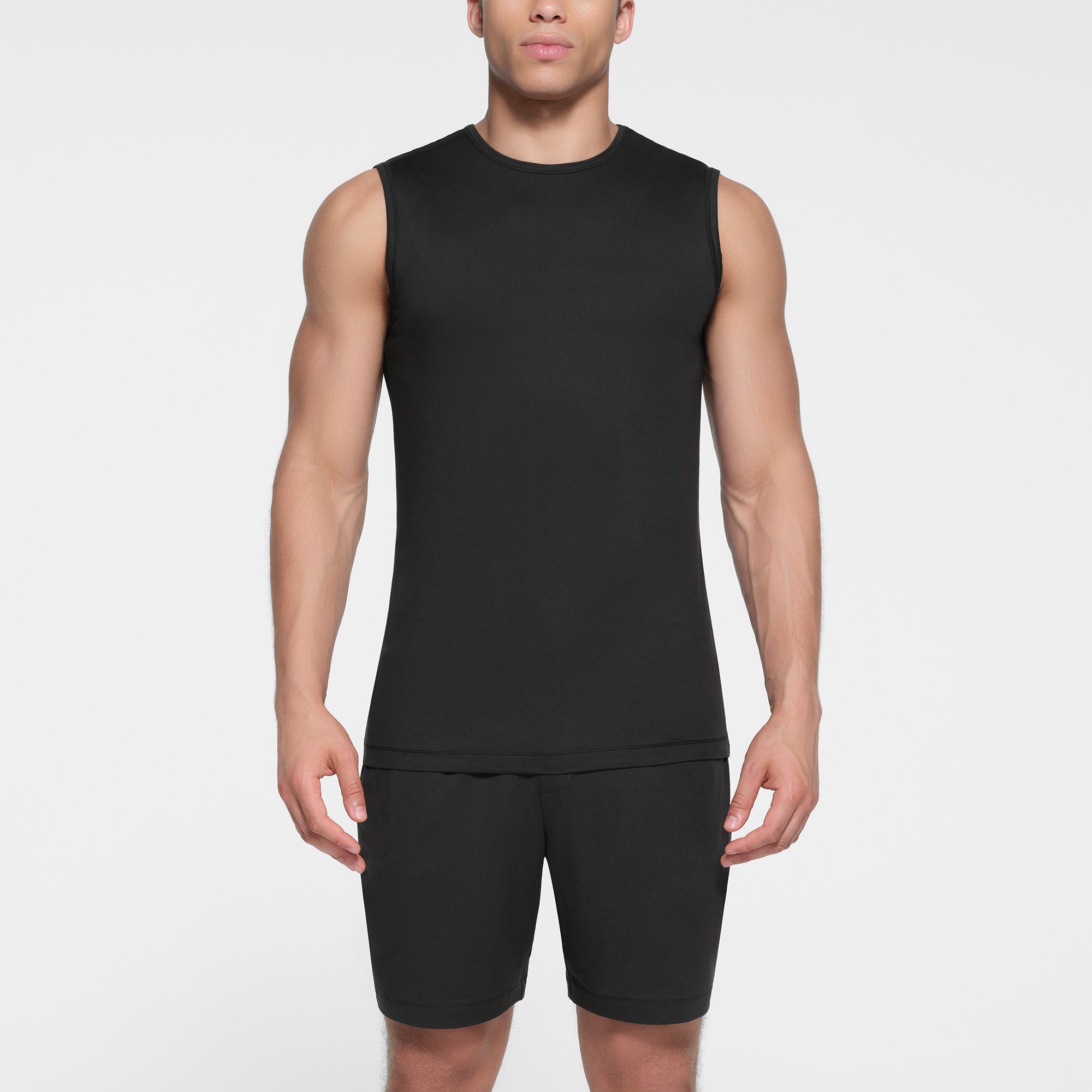 OUTDOOR JERSEY MENS MUSCLE TANK | ONYX ON A MODEL FRONT VIEW