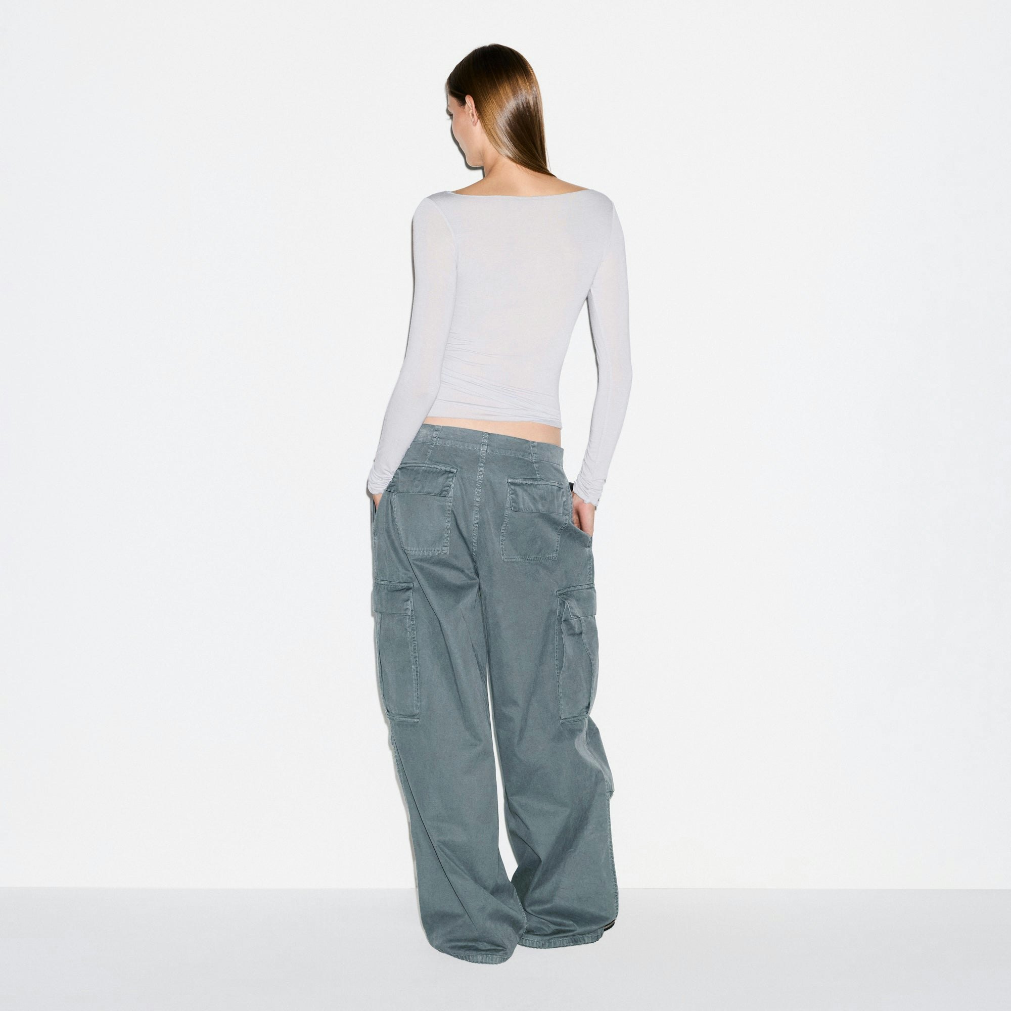 SHEER MODAL LONG SLEEVE BOATNECK TOP | MIST ON A MODEL SIDE VIEW