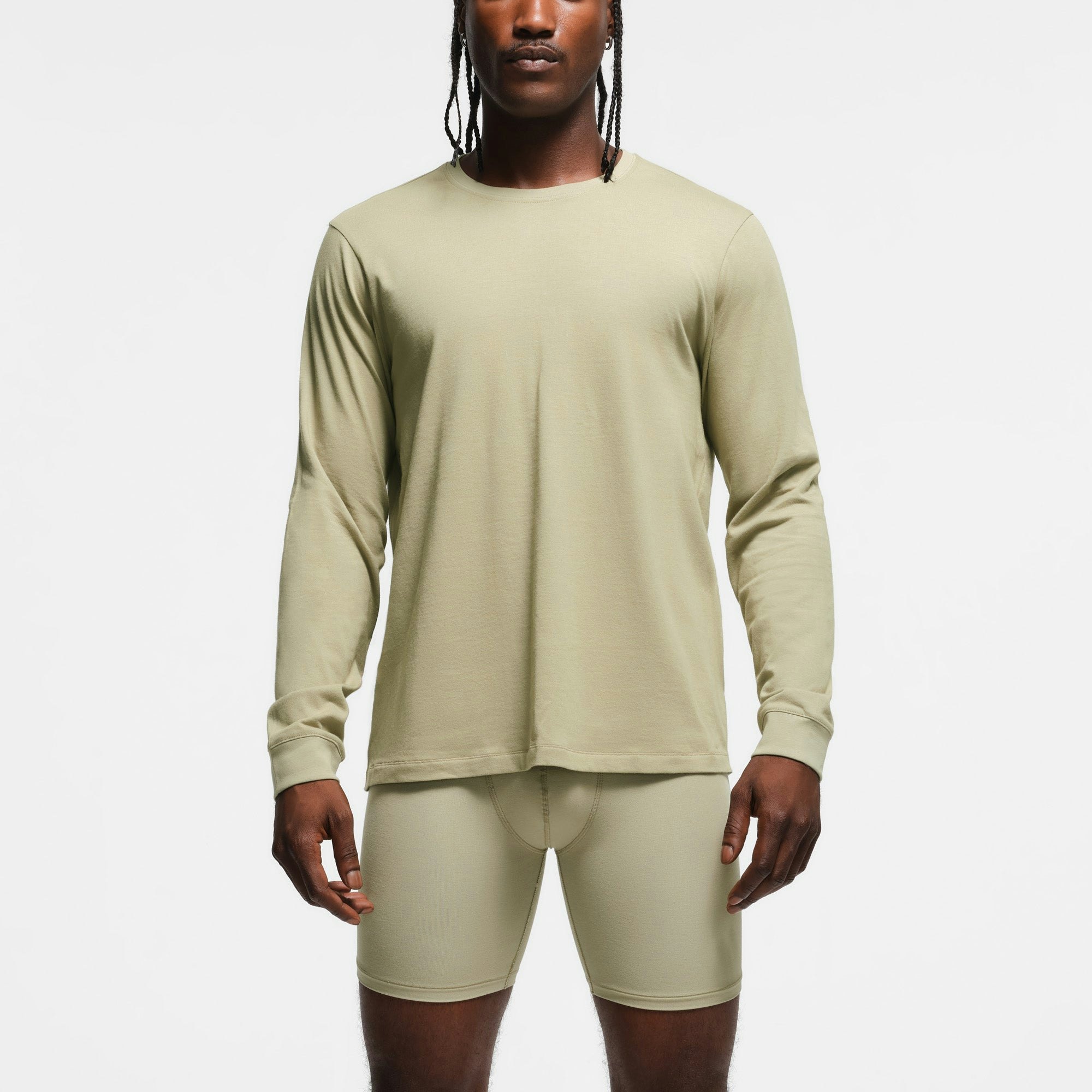 SKIMS COTTON MENS CLASSIC LONG SLEEVE T-SHIRT | PHOENIX ON A MODEL FRONT VIEW
