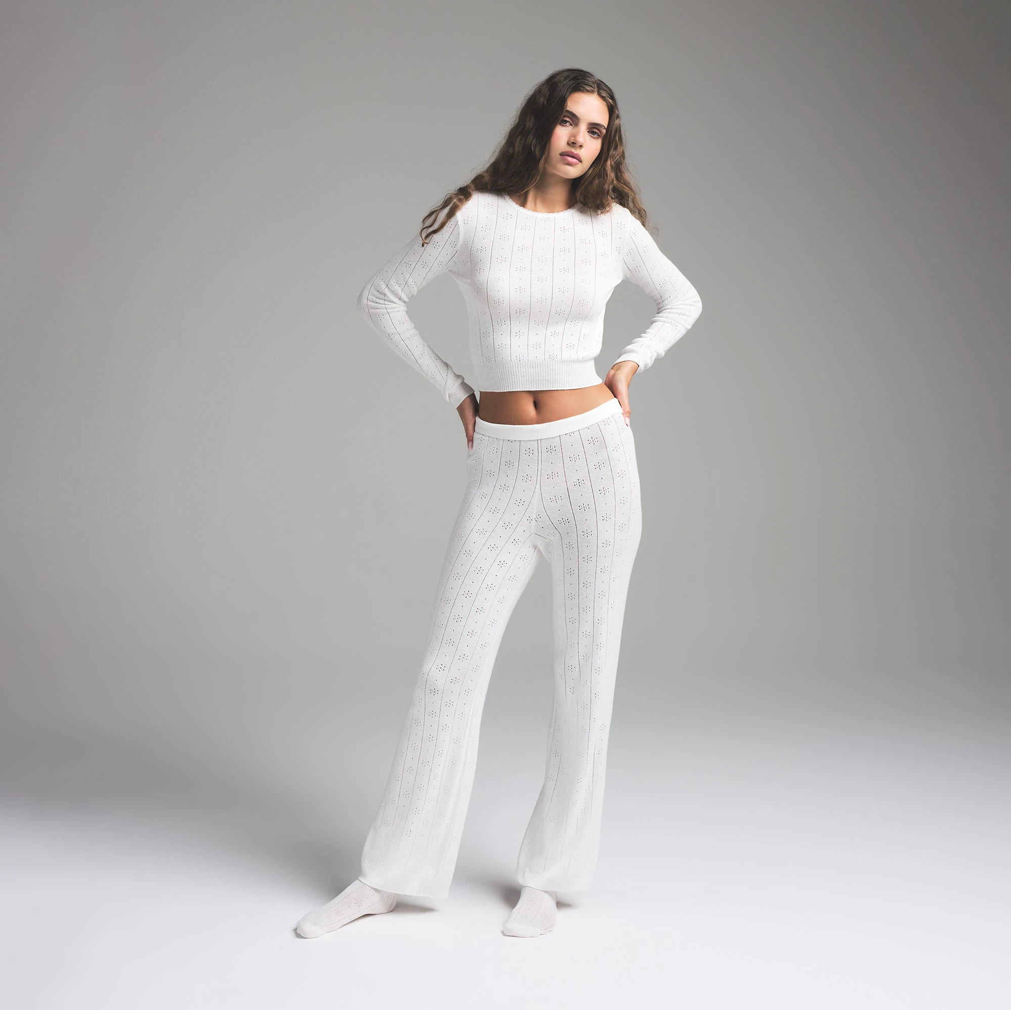 SWEATER POINTELLE LONG SLEEVE TOP | MARBLE ON A MODEL FRONT VIEW | FOCUS: 0.0, 1.0, 0.9