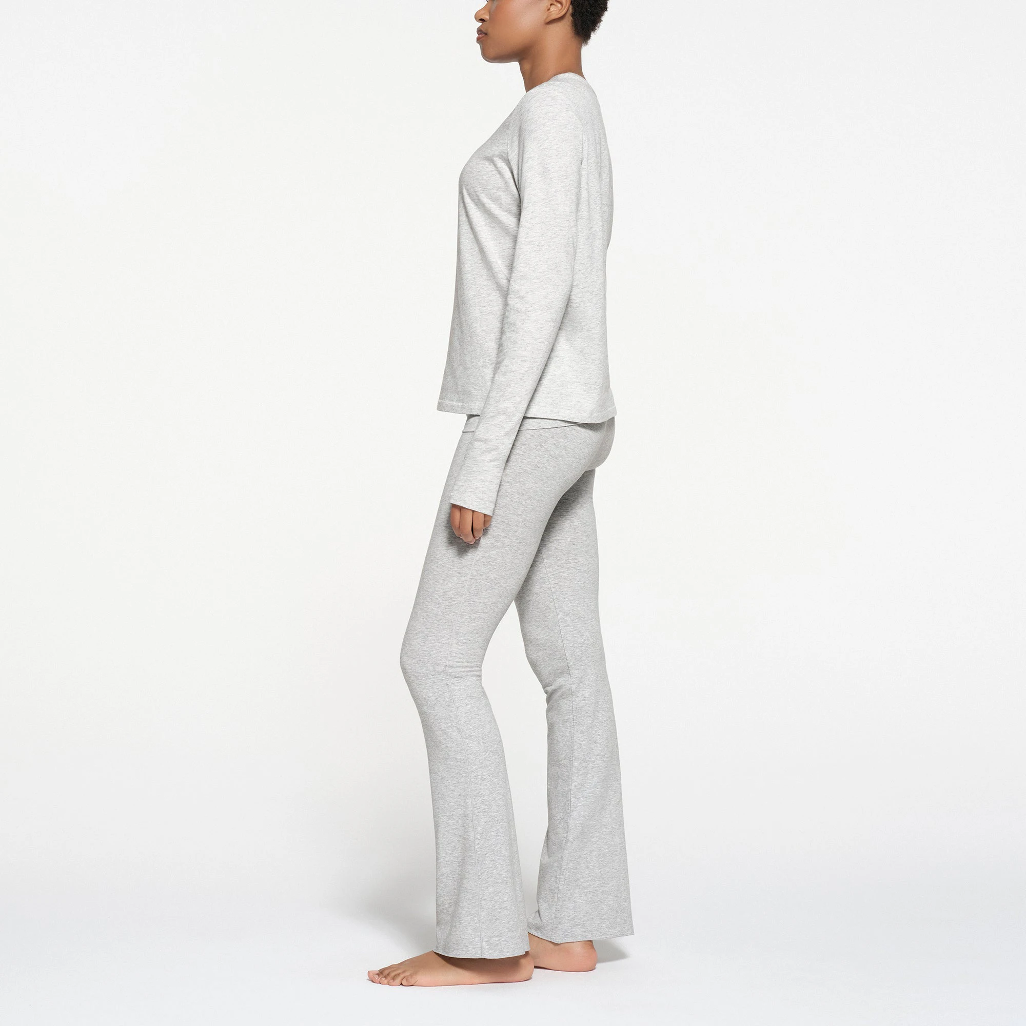 RELAXED TEES LONG SLEEVE T-SHIRT | LIGHT HEATHER GREY ON A MODEL SIDE VIEW