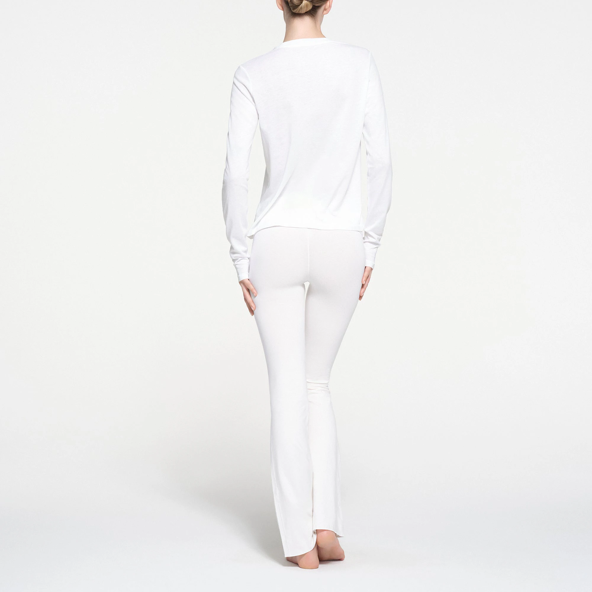 RELAXED TEES LONG SLEEVE T-SHIRT | SNOW ON A MODEL BACK VIEW