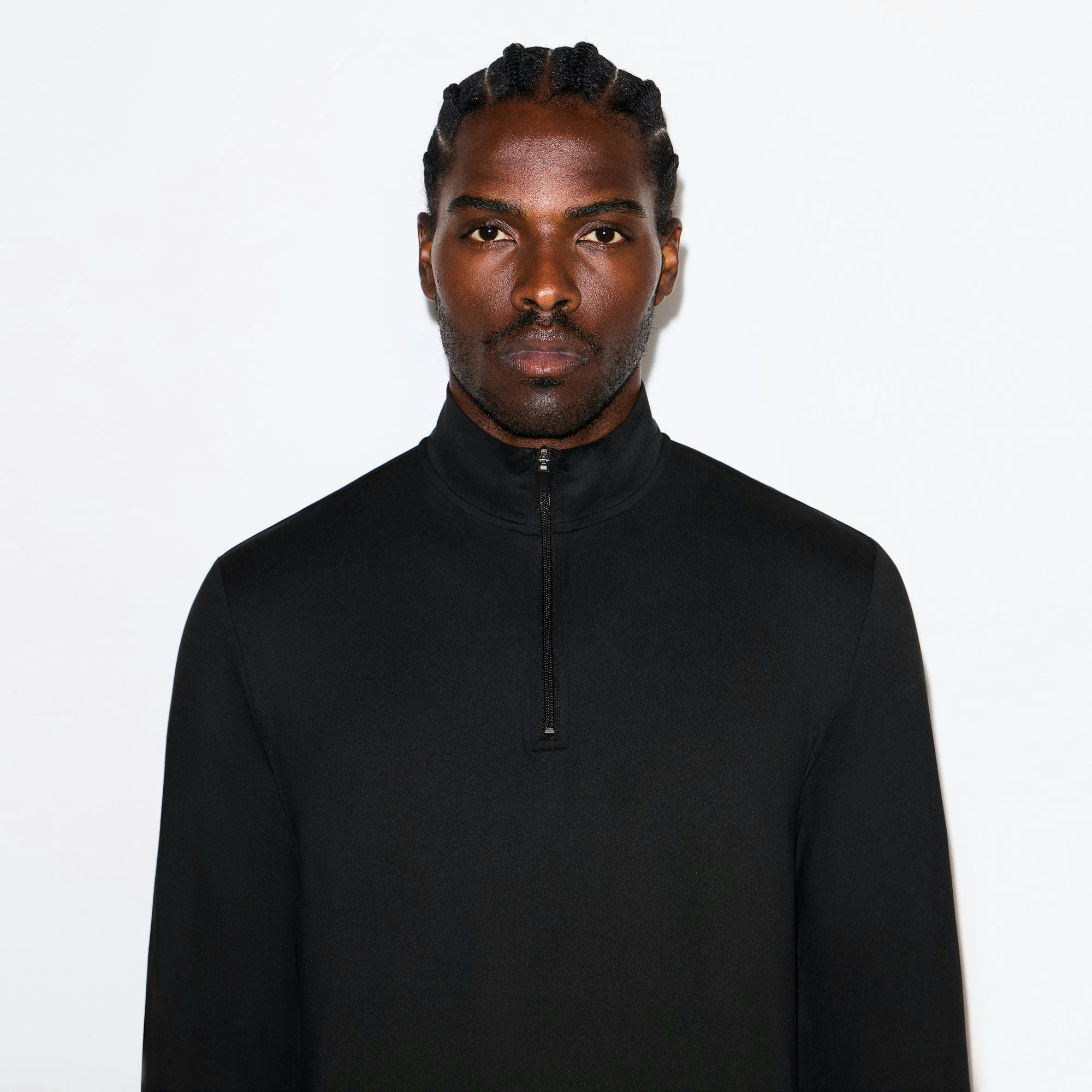 OUTDOOR JERSEY MENS HALF ZIP TOP | ONYX ON A MODEL SIDE VIEW @ | FOCUS: 0.0, 1.0, 0.9