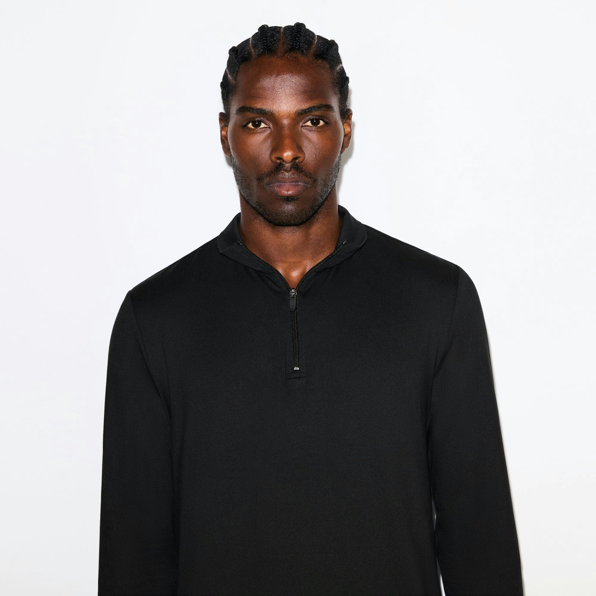 OUTDOOR JERSEY MENS HALF ZIP TOP | ONYX ON A MODEL SIDE VIEW @ | FOCUS: 0.0, 1.0, 0.9