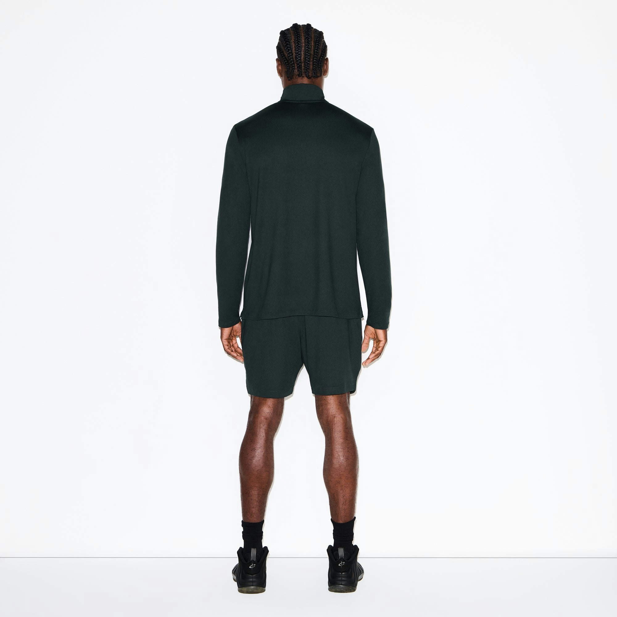 OUTDOOR JERSEY MENS HALF ZIP TOP | TINT ON A MODEL FRONT VIEW @ | FOCUS: 0.0, 1.0, 0.9