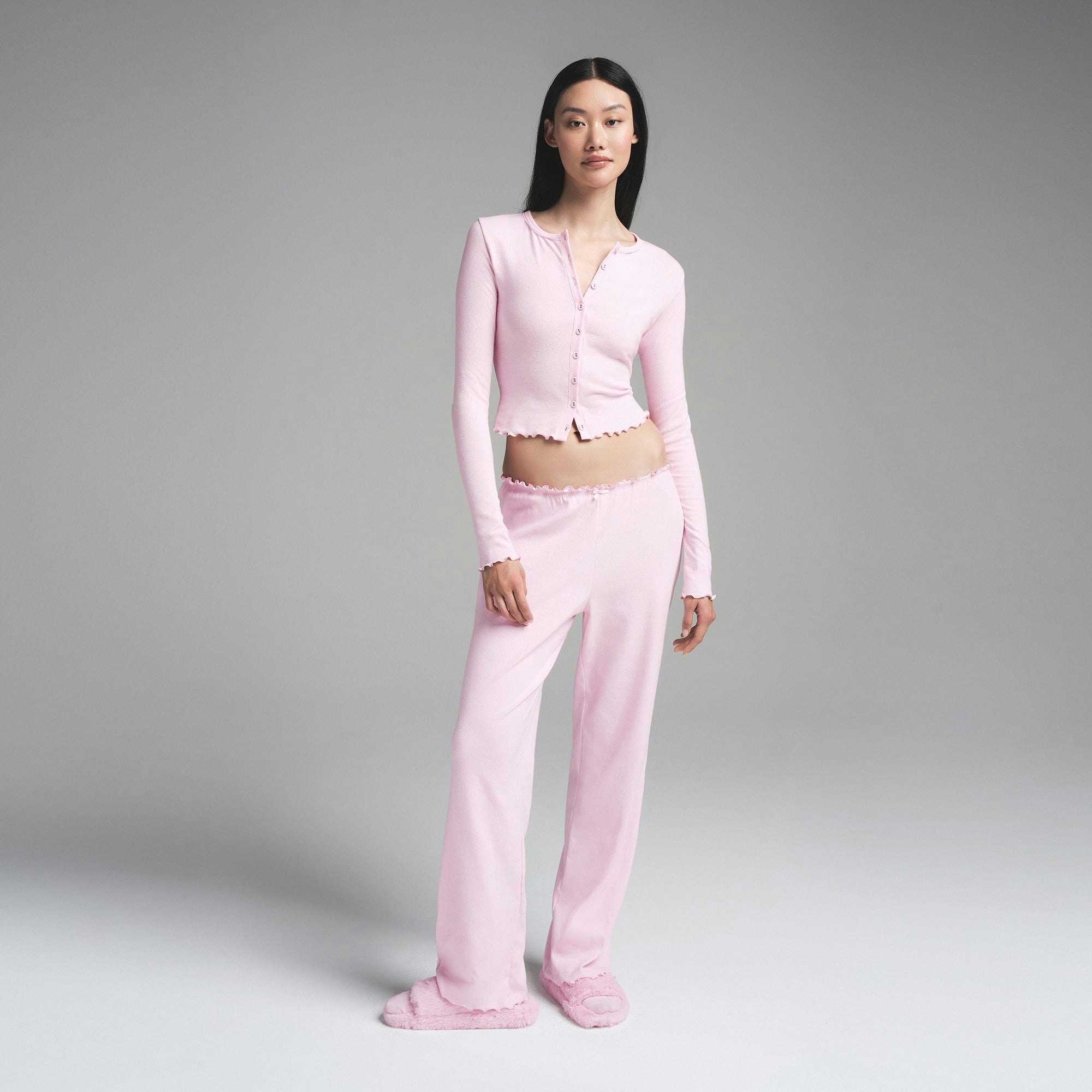 LOGO POINTELLE CARDIGAN | CHERRY BLOSSOM ON A MODEL FRONT VIEW | FOCUS: 0.0, 1.0, 0.9