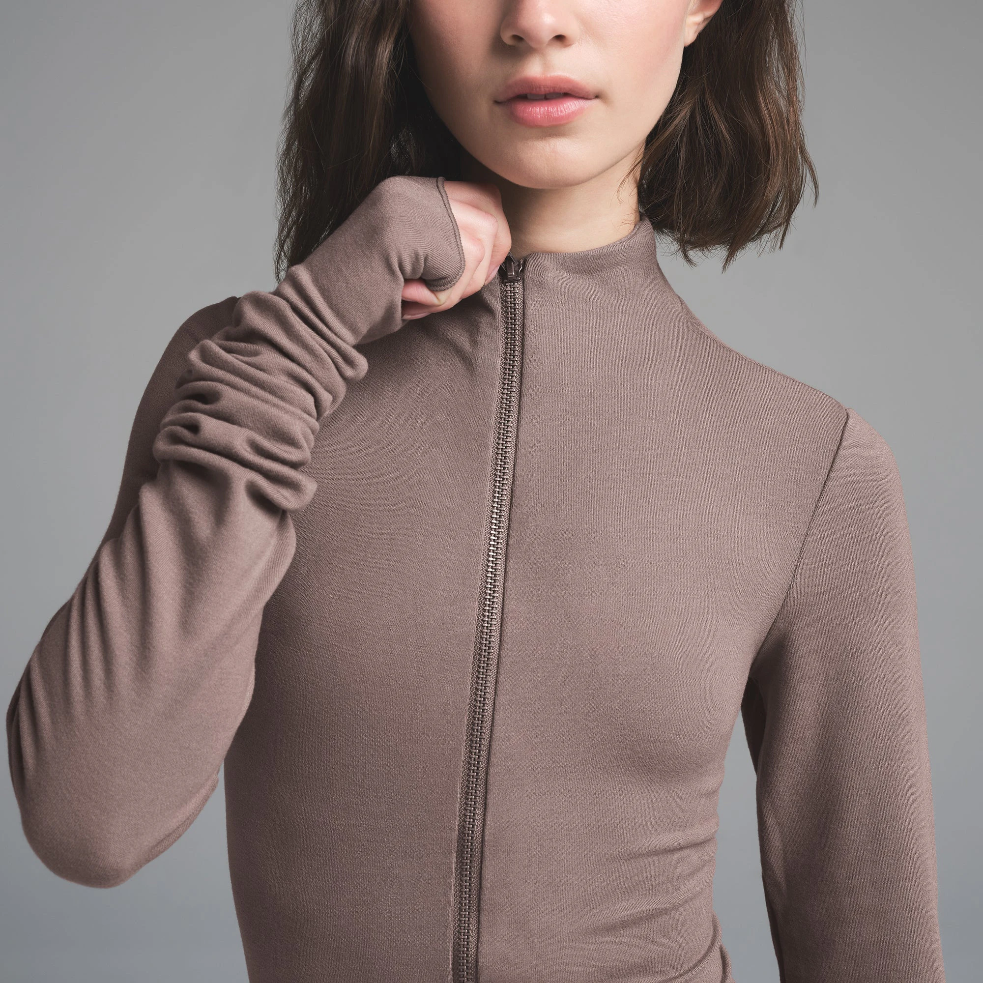 SKIMS CLOUD ZIP UP TOP | AMETHYST ON A MODEL FRONT VIEW | FOCUS: 0.0, 1.0, 0.9