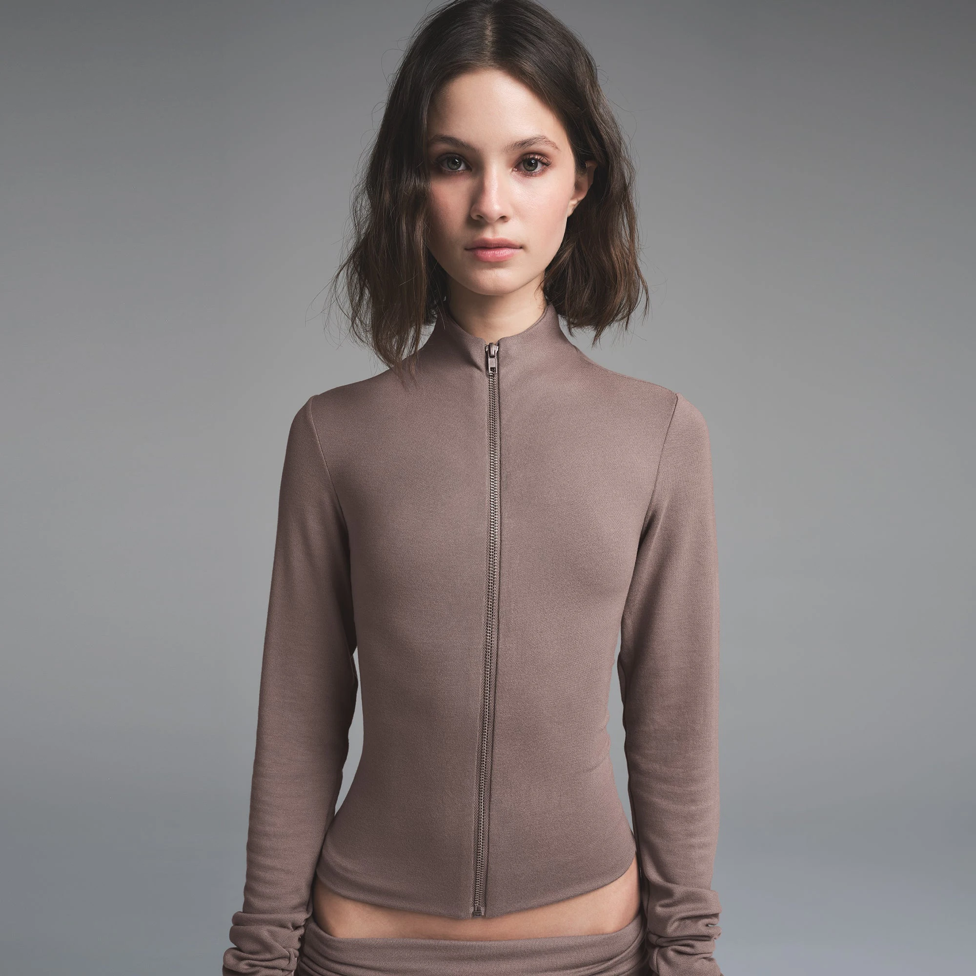 SKIMS CLOUD ZIP UP TOP | AMETHYST ON A MODEL FRONT VIEW | FOCUS: 0.0, 1.0, 0.9