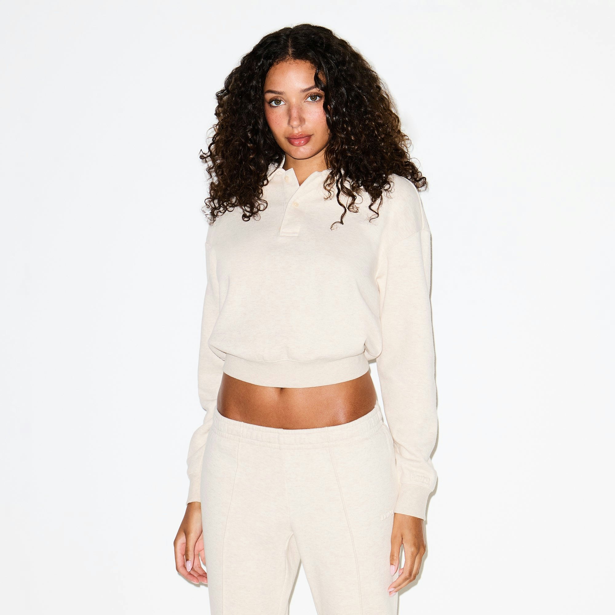 COTTON FLEECE POLO SWEATSHIRT | OATMEAL HEATHER ON A MODEL FRONT VIEW @ | FOCUS: 0.0, 1.0, 0.9