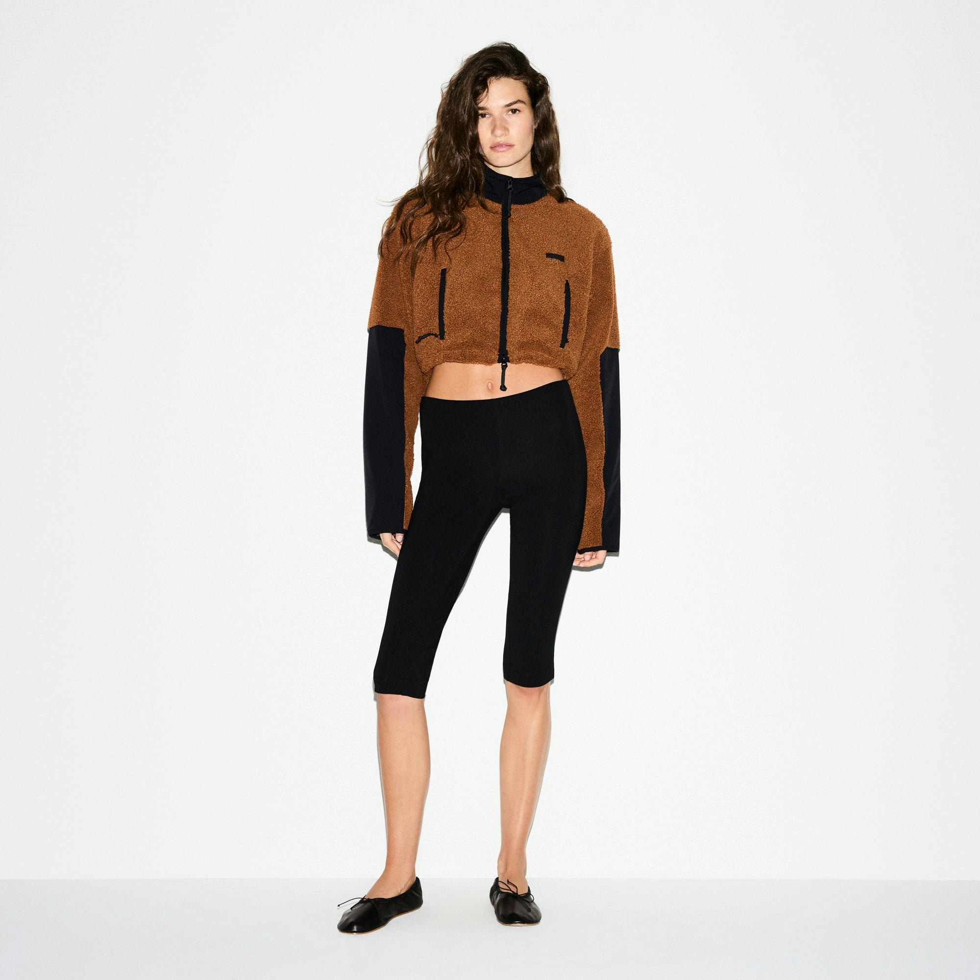 TEDDY FUNNEL NECK CROPPED JACKET | CHAI ON A MODEL SIDE VIEW @ | FOCUS: 0.0, 1.0, 0.9