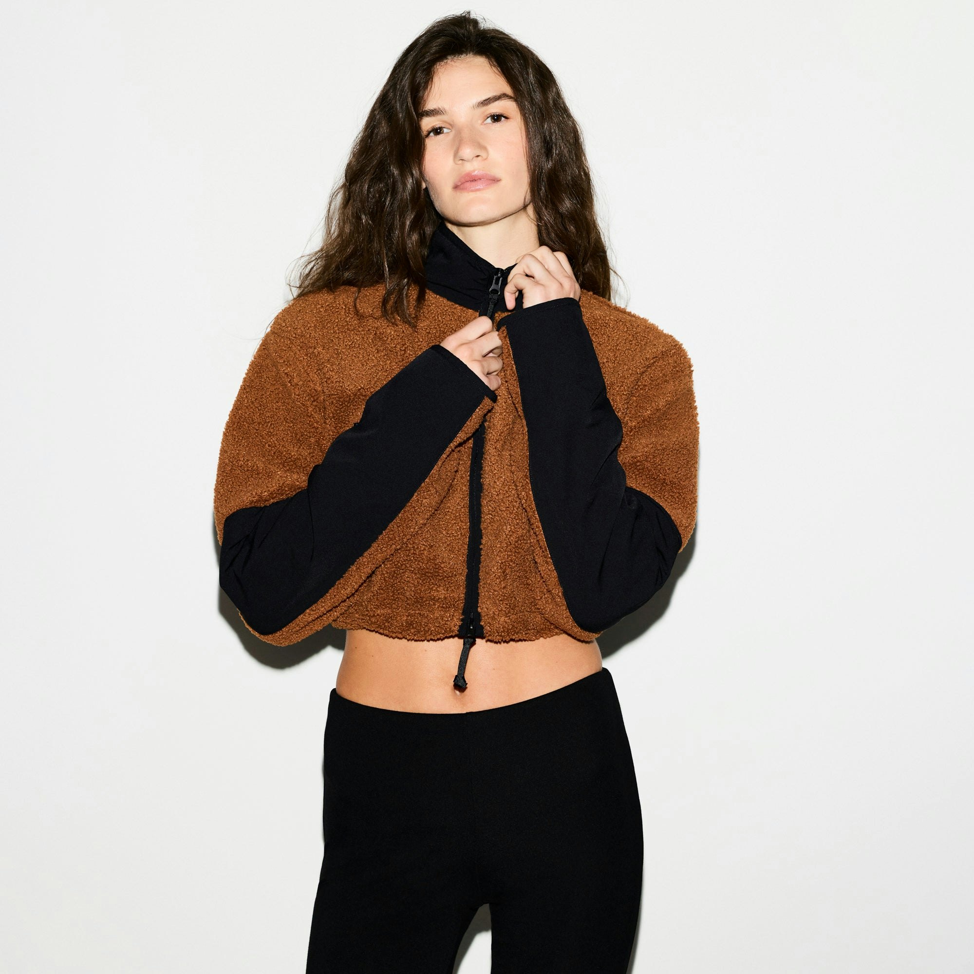 TEDDY FUNNEL NECK CROPPED JACKET | CHAI ON A MODEL SIDE VIEW @ | FOCUS: 0.0, 1.0, 0.9
