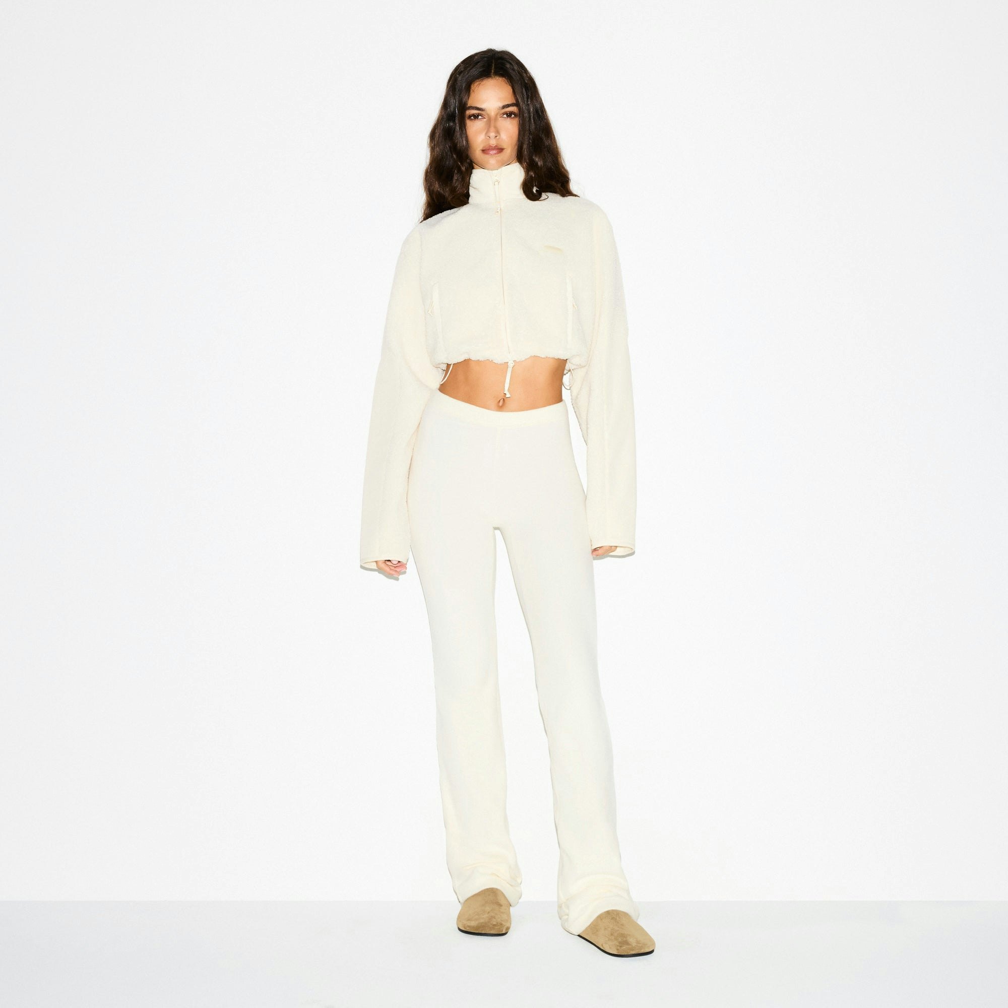 TEDDY FUNNEL NECK CROPPED JACKET | ECRU ON A MODEL FRONT VIEW @ | FOCUS: 0.0, 1.0, 0.9
