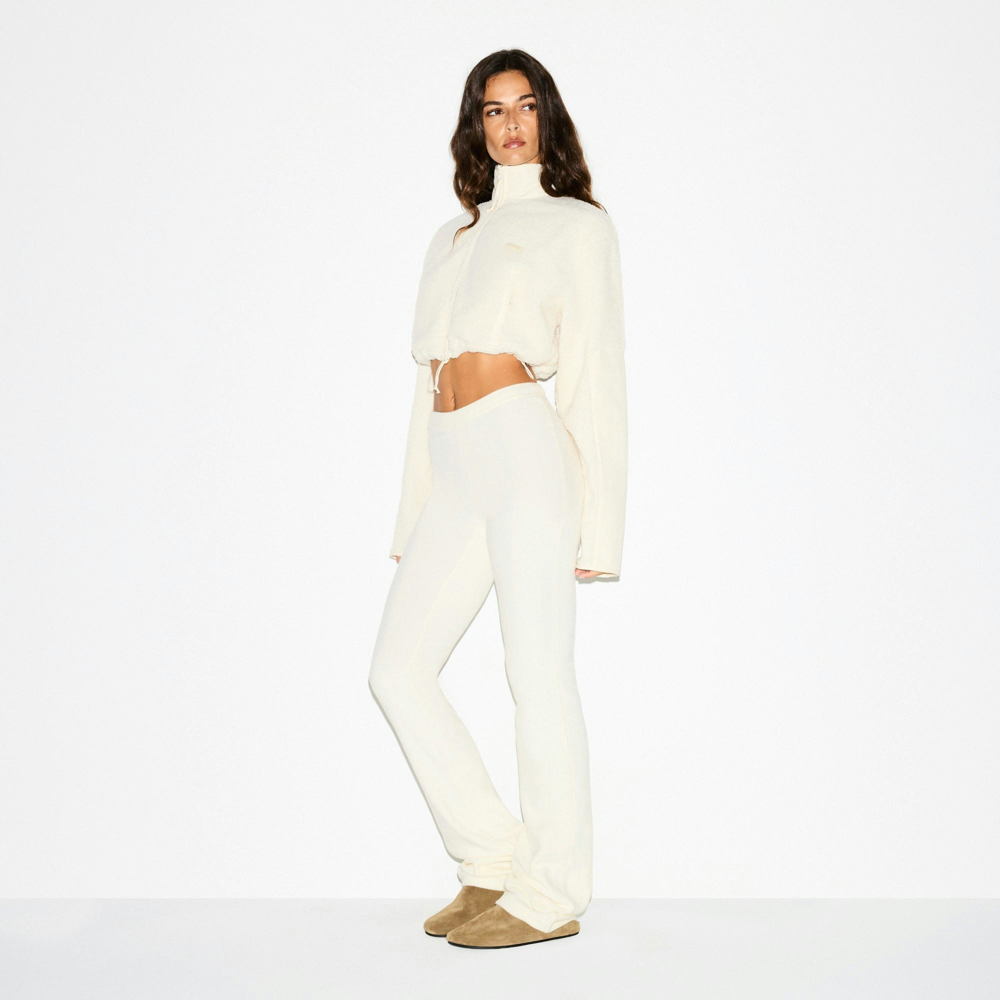 TEDDY FUNNEL NECK CROPPED JACKET | ECRU ON A MODEL FRONT VIEW @ | FOCUS: 0.0, 1.0, 0.9