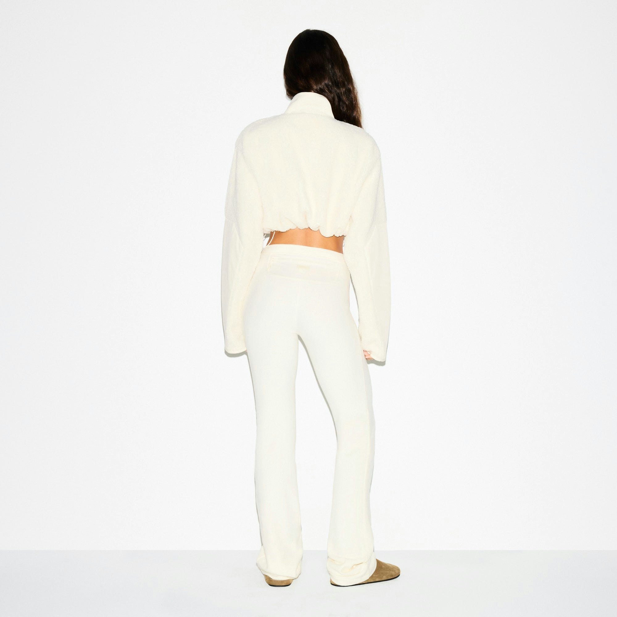 TEDDY FUNNEL NECK CROPPED JACKET | ECRU ON A MODEL SIDE VIEW @ | FOCUS: 0.0, 1.0, 0.9