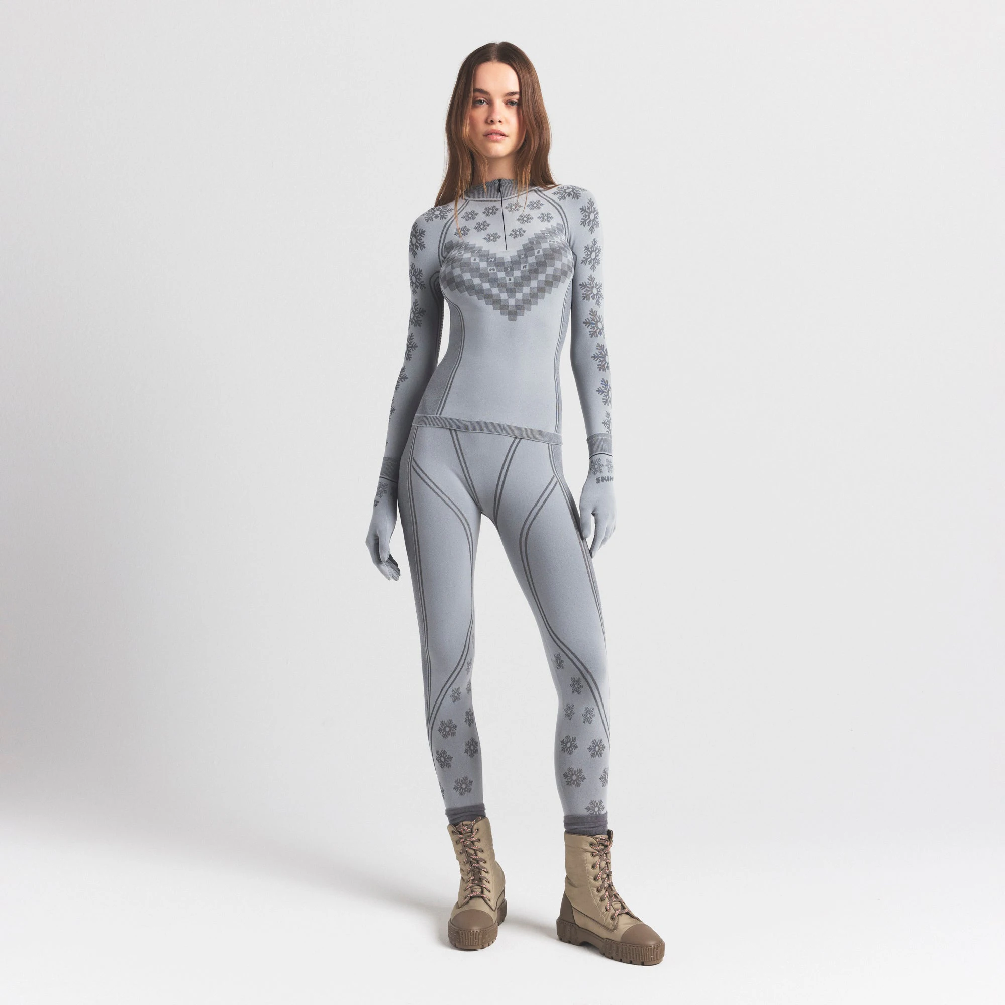 SKIMS FIRST LAYERS HALF ZIP LONG SLEEVE | MIRROR WINTER FAIR ISLE ON A MODEL FRONT VIEW @ | FOCUS: 0.0, 1.0, 0.9