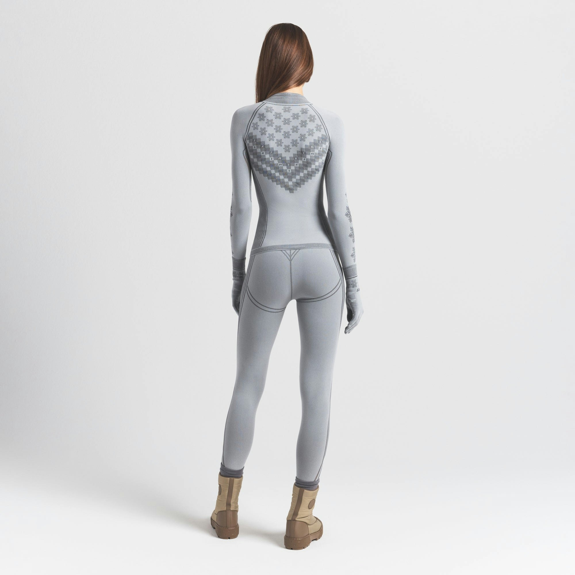 SKIMS FIRST LAYERS HALF ZIP LONG SLEEVE | MIRROR WINTER FAIR ISLE ON A MODEL SIDE VIEW @ | FOCUS: 0.0, 1.0, 0.9
