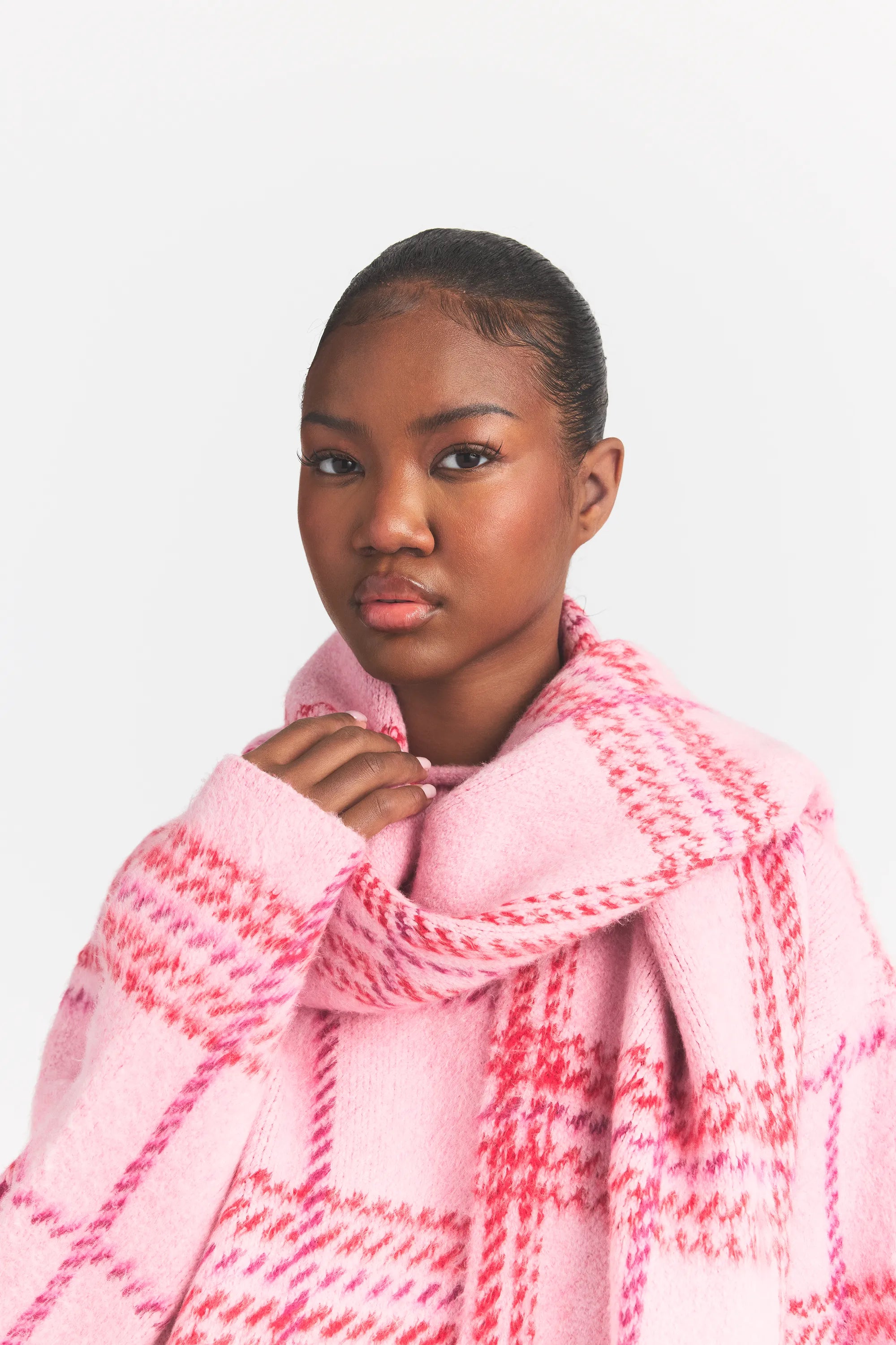 BRUSHED PLAID SCARF | PINK BIG HOLLY PLAID ON A MODEL FRONT VIEW @ | FOCUS: 0.0, 1.0, 0.9