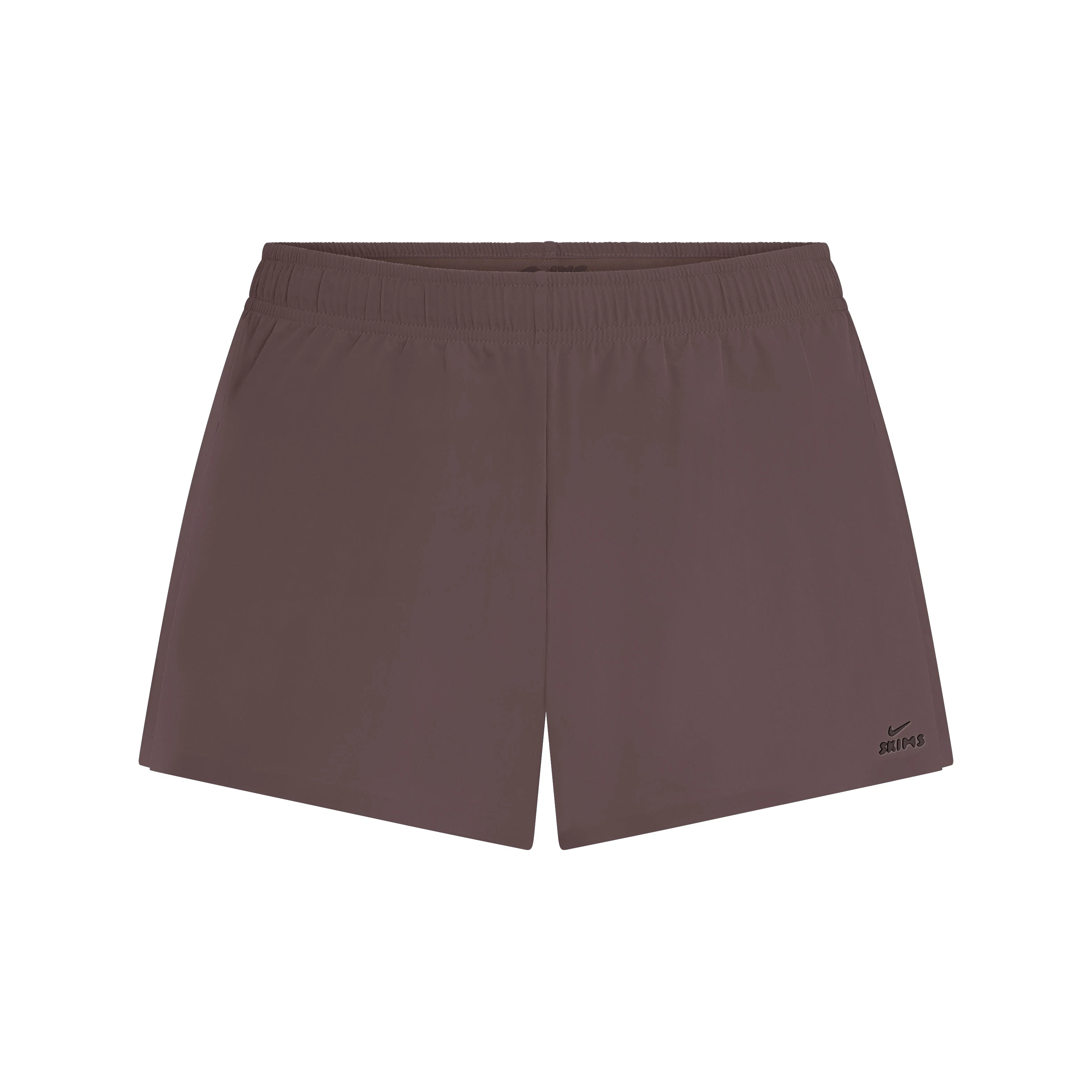 NikeSKIMS STRETCH NYLON RUNNER SHORT | NSKM RESIN FLAT ON A WHITE BACKGROUND | FLT
